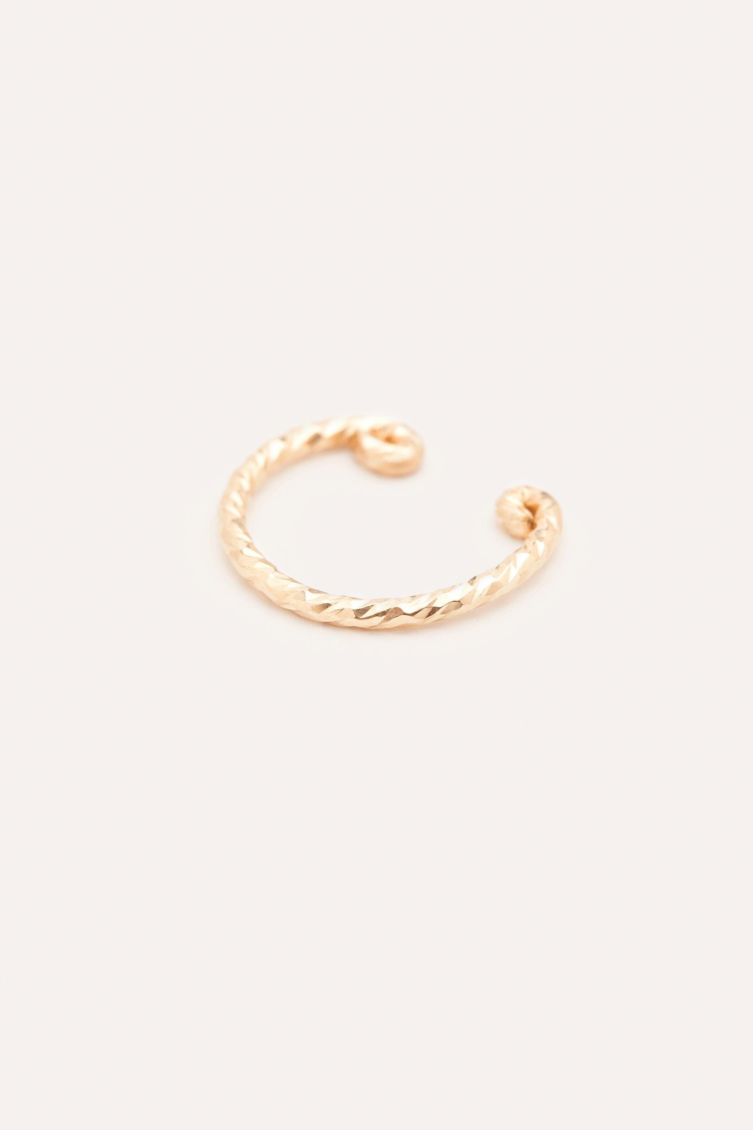 Piercing finto con brillantini