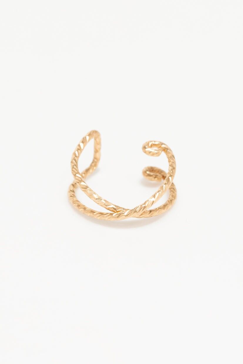 Piercing a croce finta scintillante