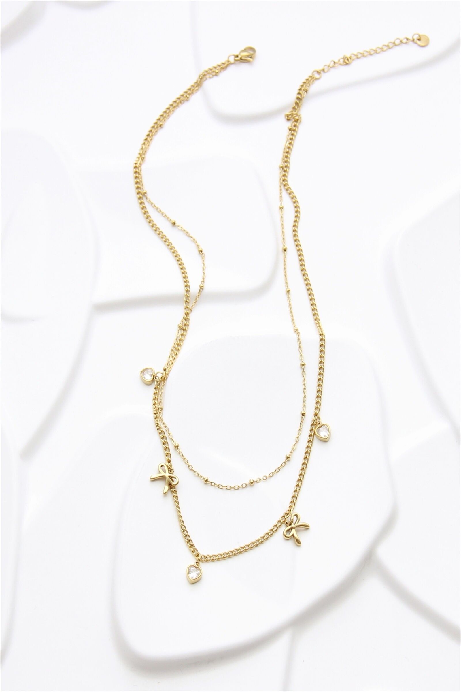 Collier Multi-Rangs Doré en Acier Inoxydable – Nœuds et Cœurs Zirconium