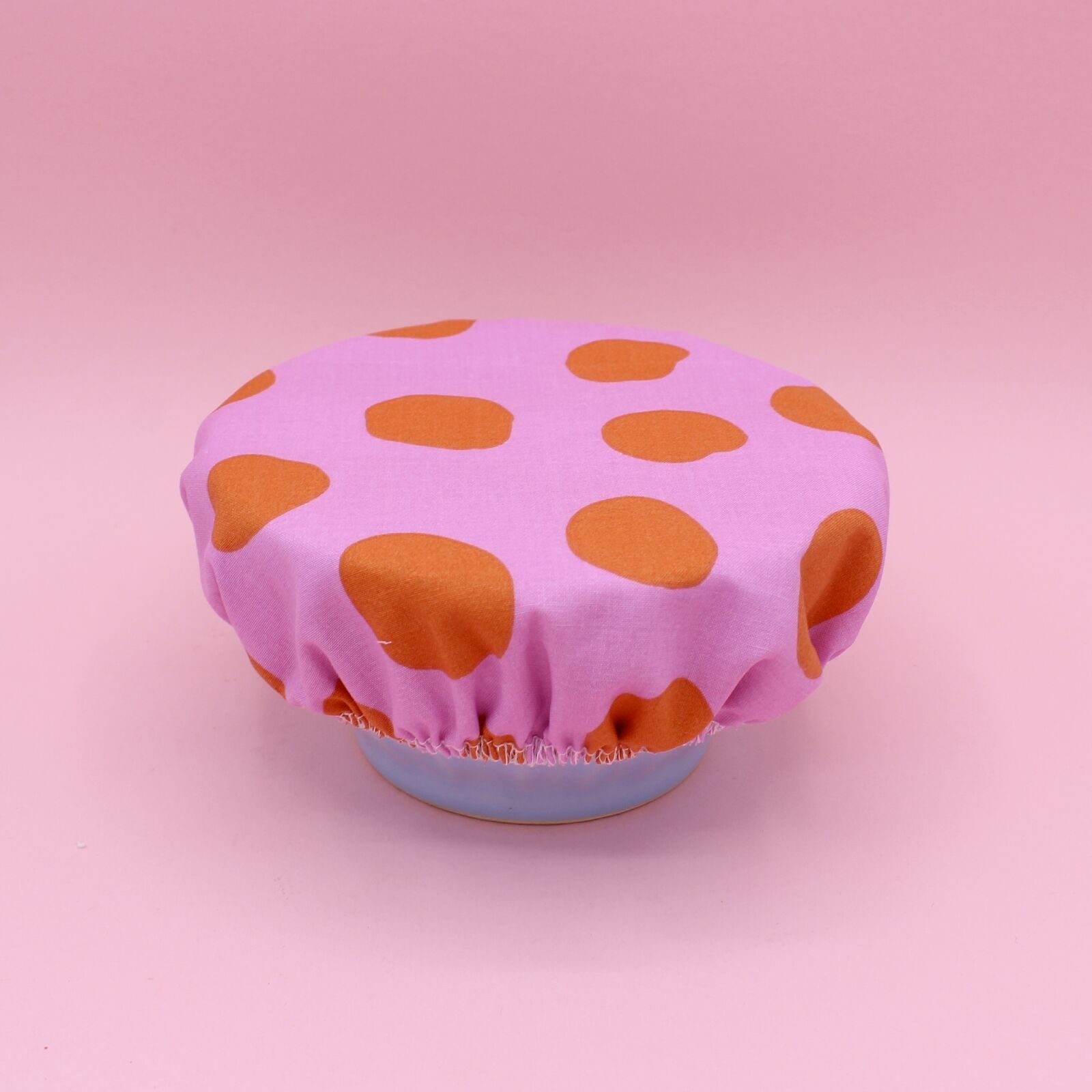 Charlotte dish cover - coated fabric - pink with orange polka dots