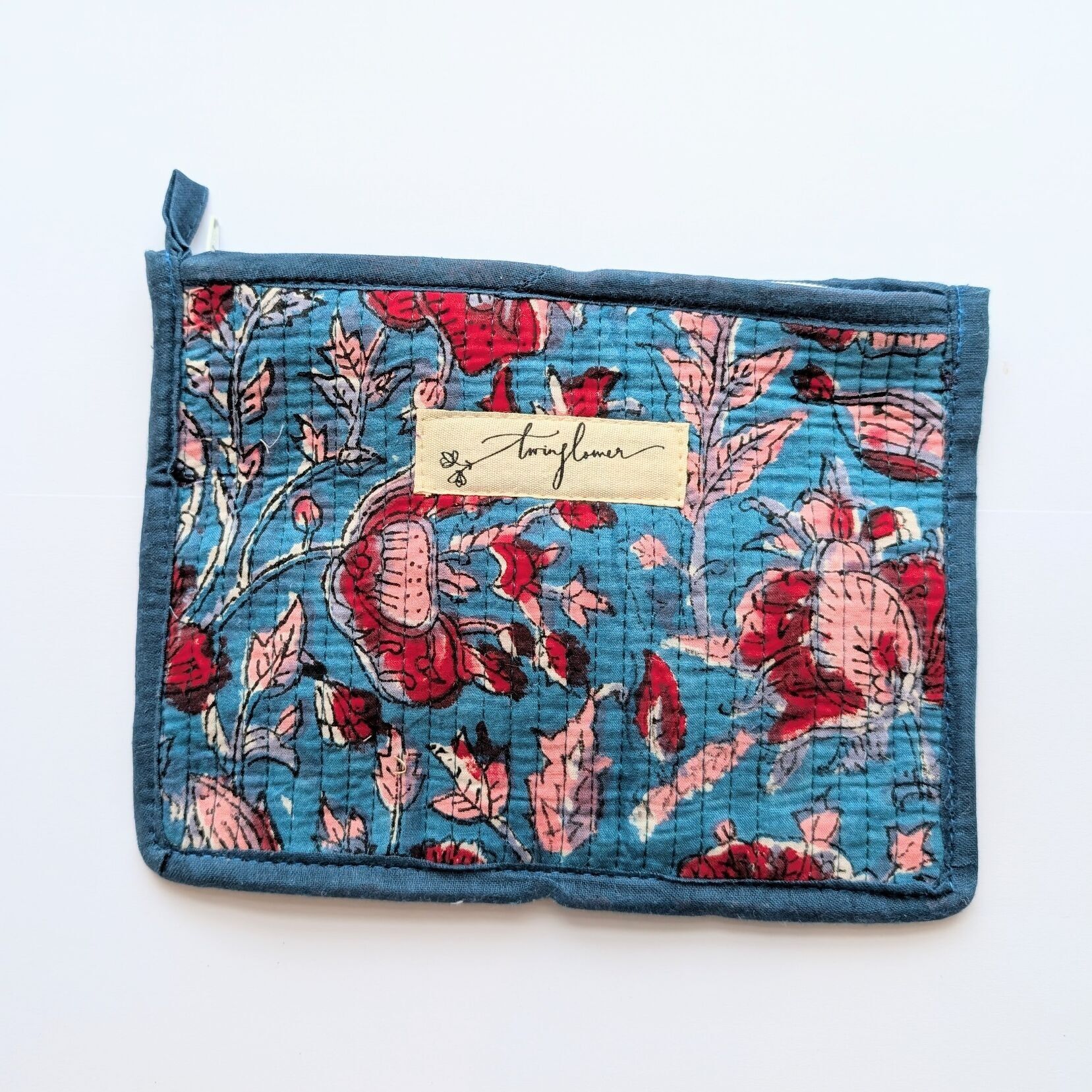 Sac à main matelassé de taille moyenne à imprimé floral bleu et rouge