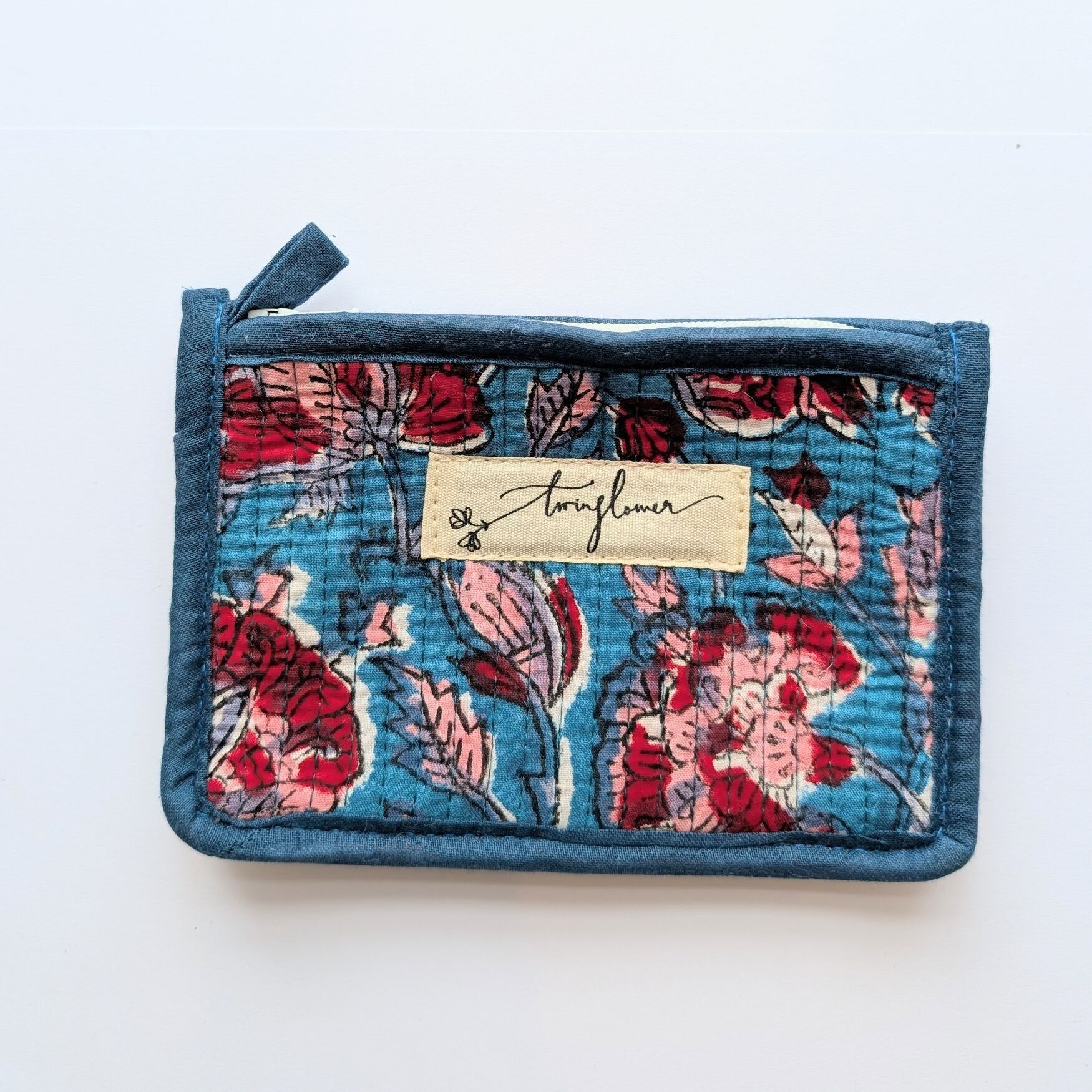 Petit sac à main matelassé à imprimé floral bleu et rouge