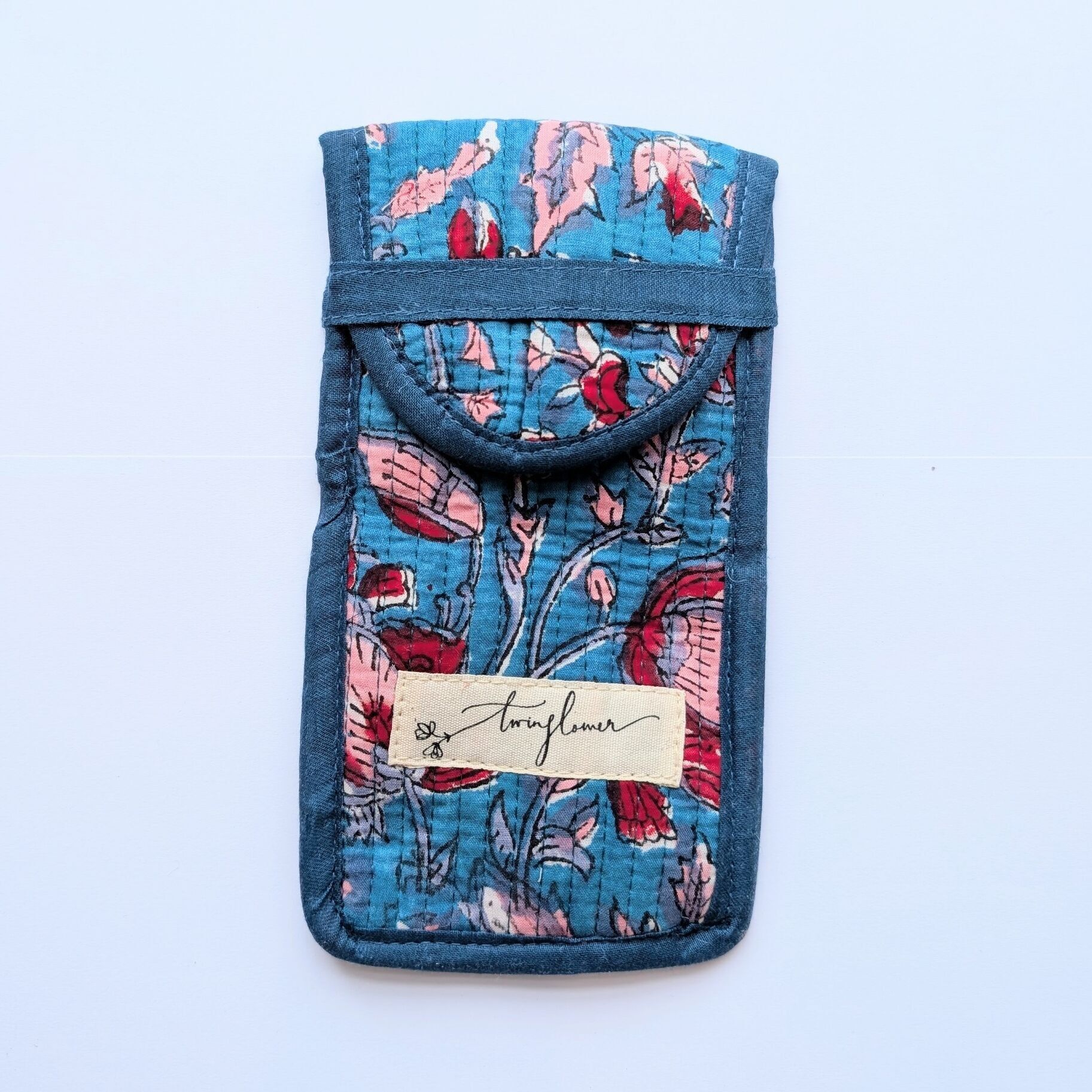 Étui à lunettes matelassé à imprimé floral bleu et rouge