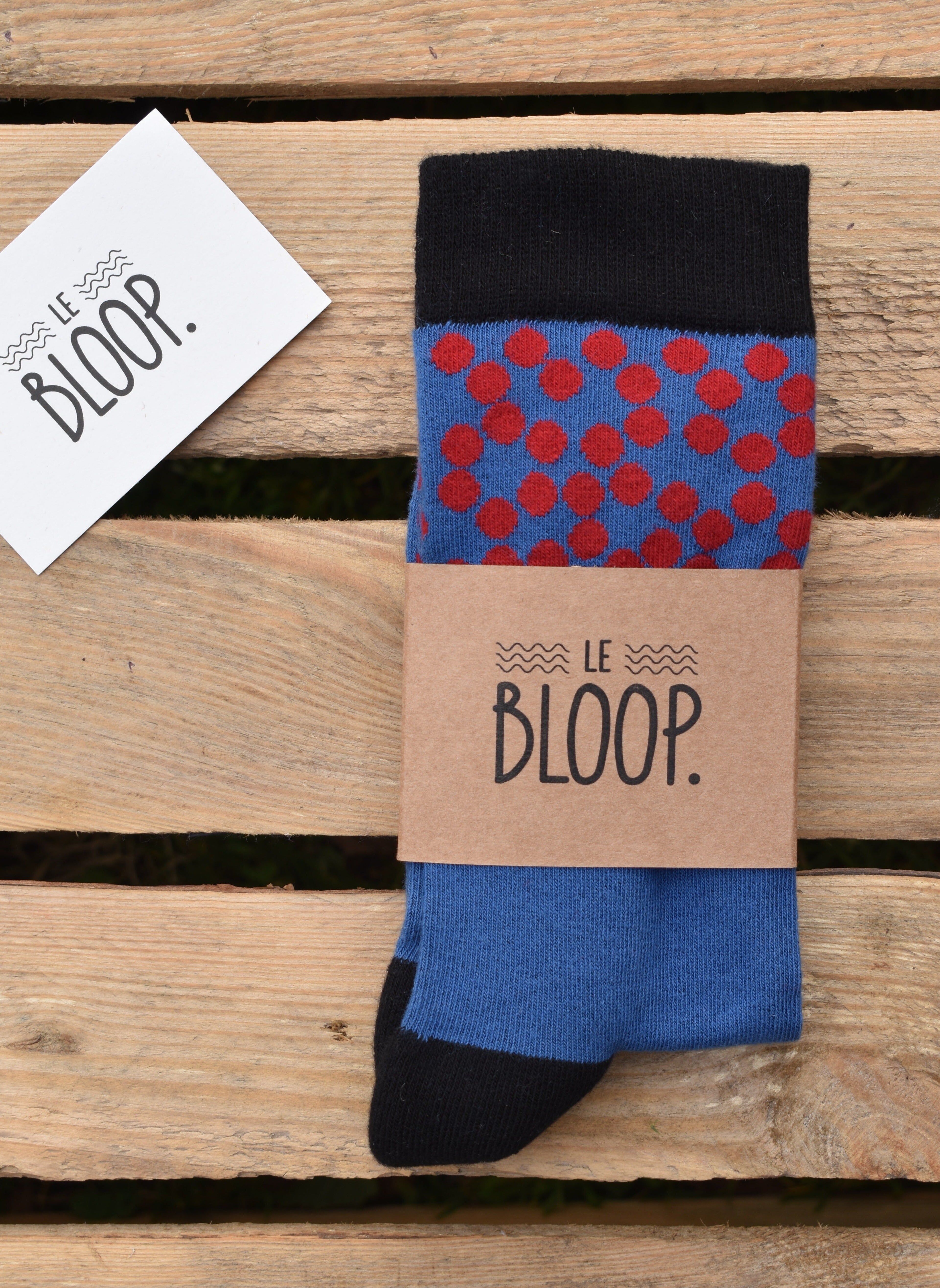 Blue socks with red polka dots