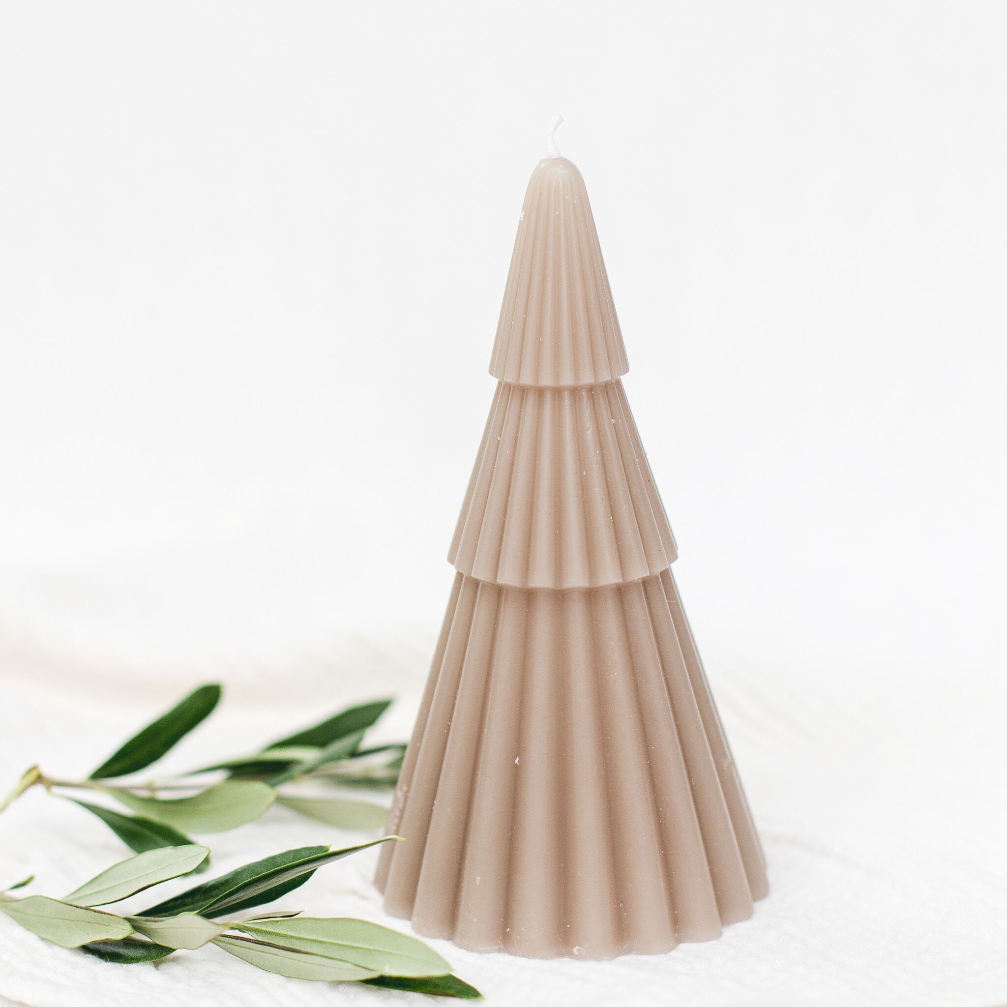 Piccola candela profumata a forma di albero