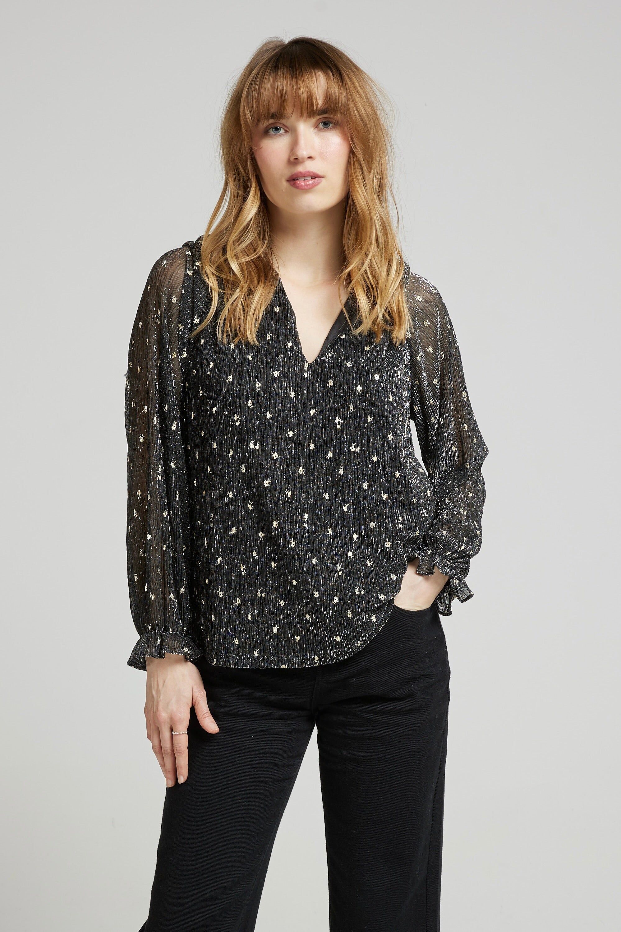 CISSILIA - Elegante top negro de manga larga