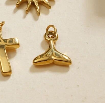 Set di 3 ciondoli a coda di pesce in oro