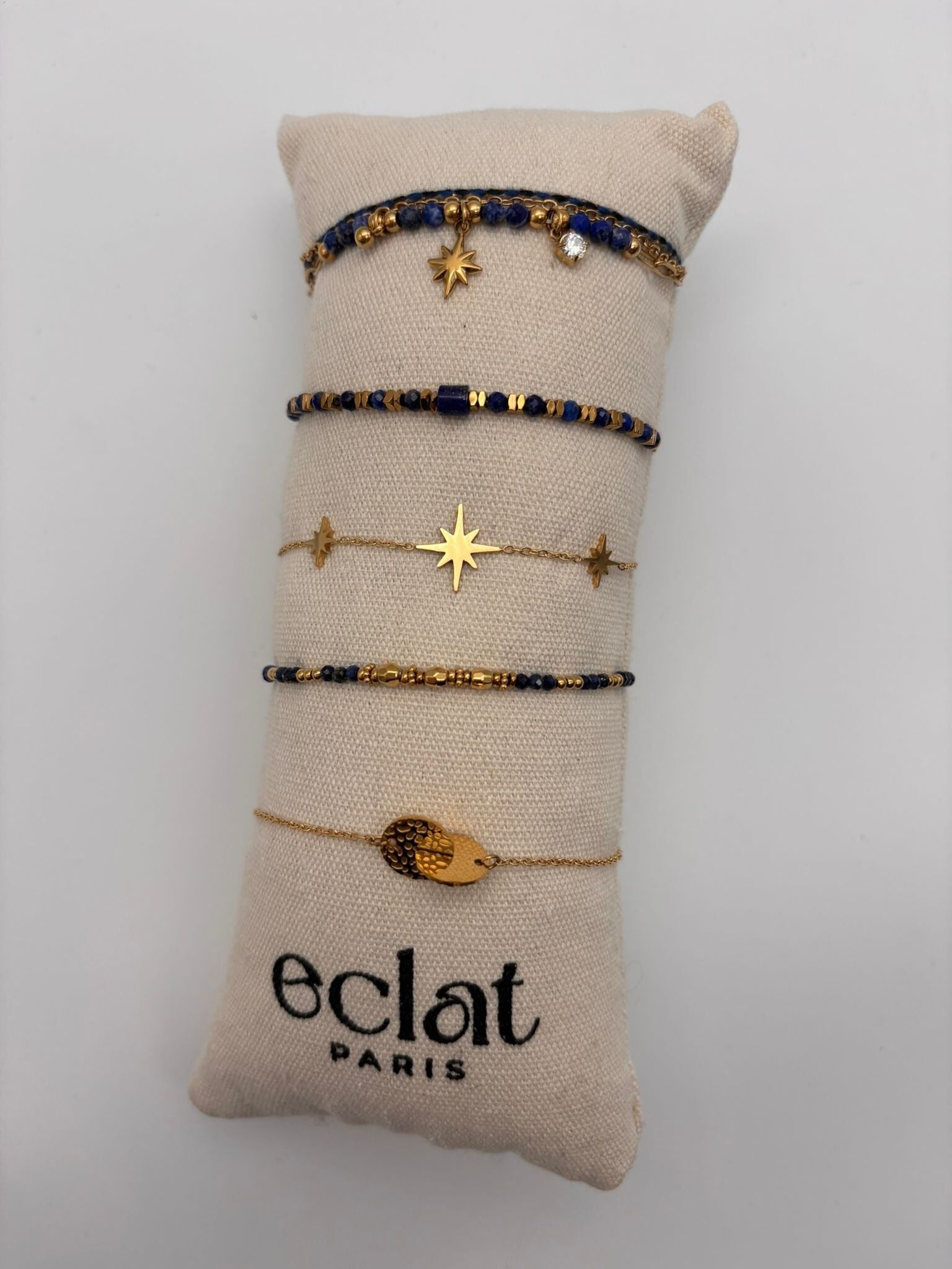 Set di bracciali in oro con pietre blu