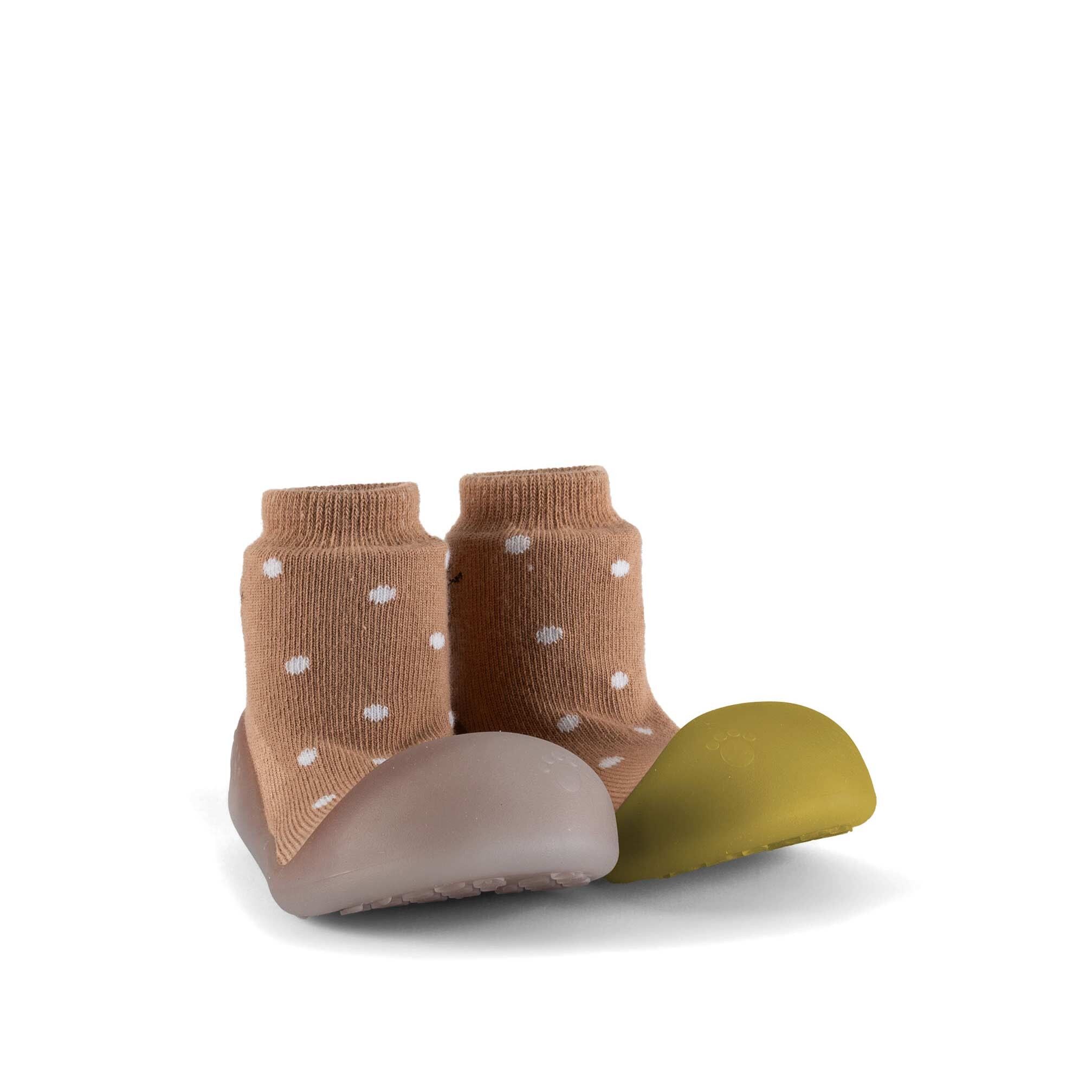 Babyschuhe, die im Sonnenlicht die Farbe wechseln Eichhörnchen Großzehen Chamäleon