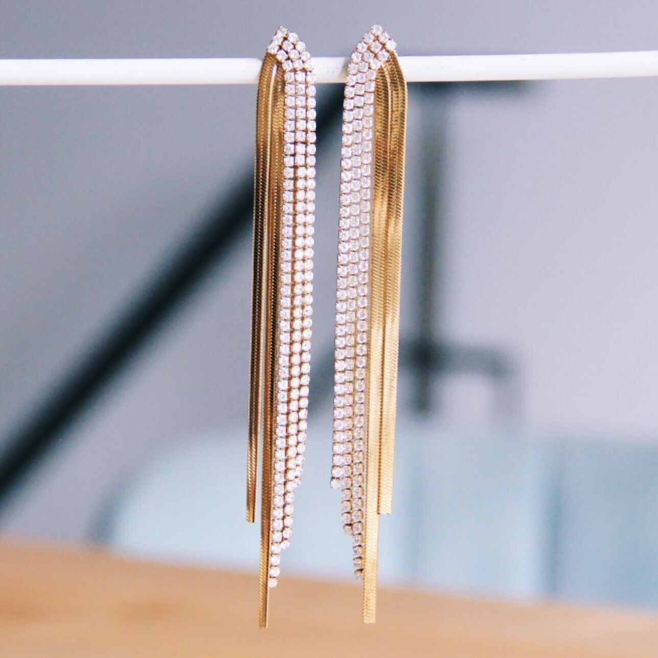 Orecchini a cascata con zirconi - oro