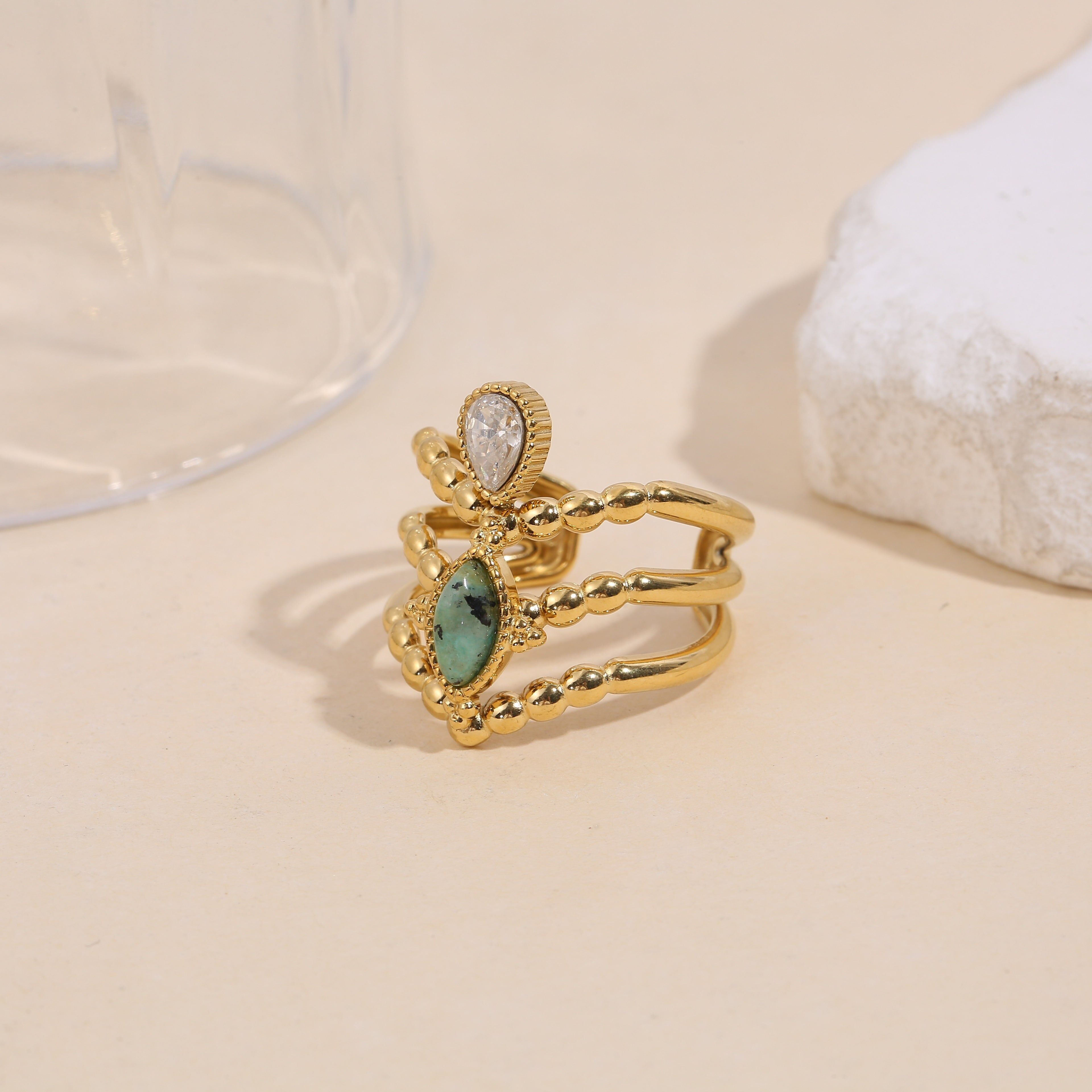 Anello a corona in oro con turchese africano e strass