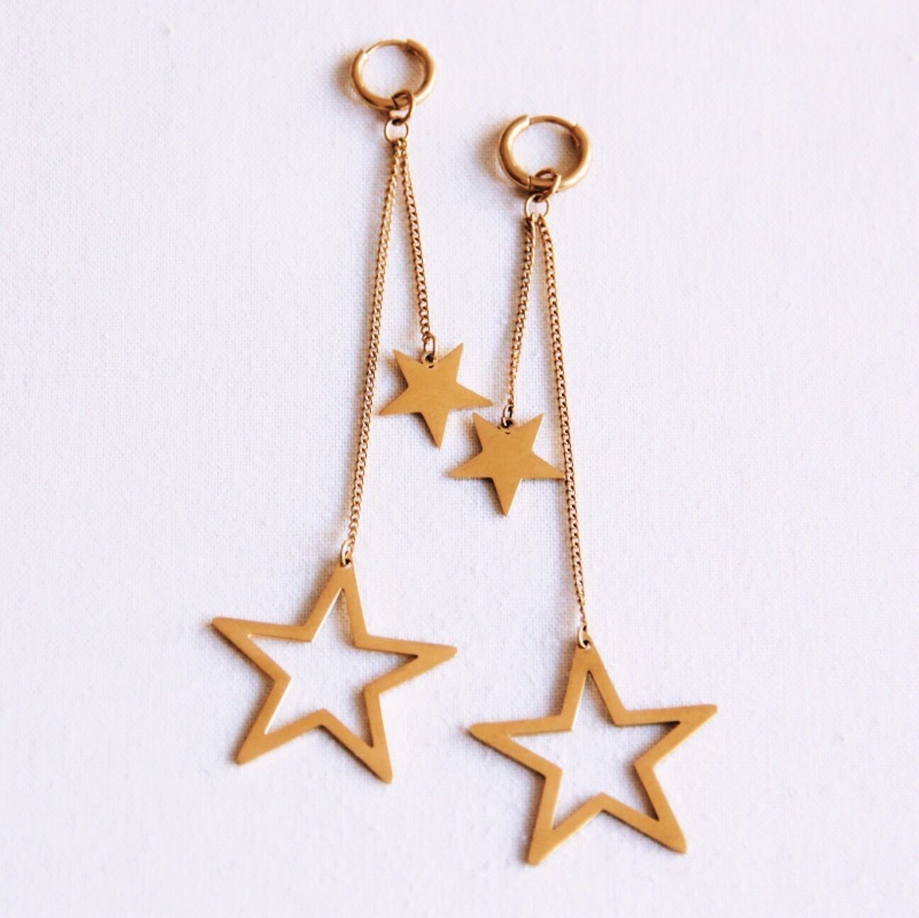 Orecchini lunghi a stella - oro