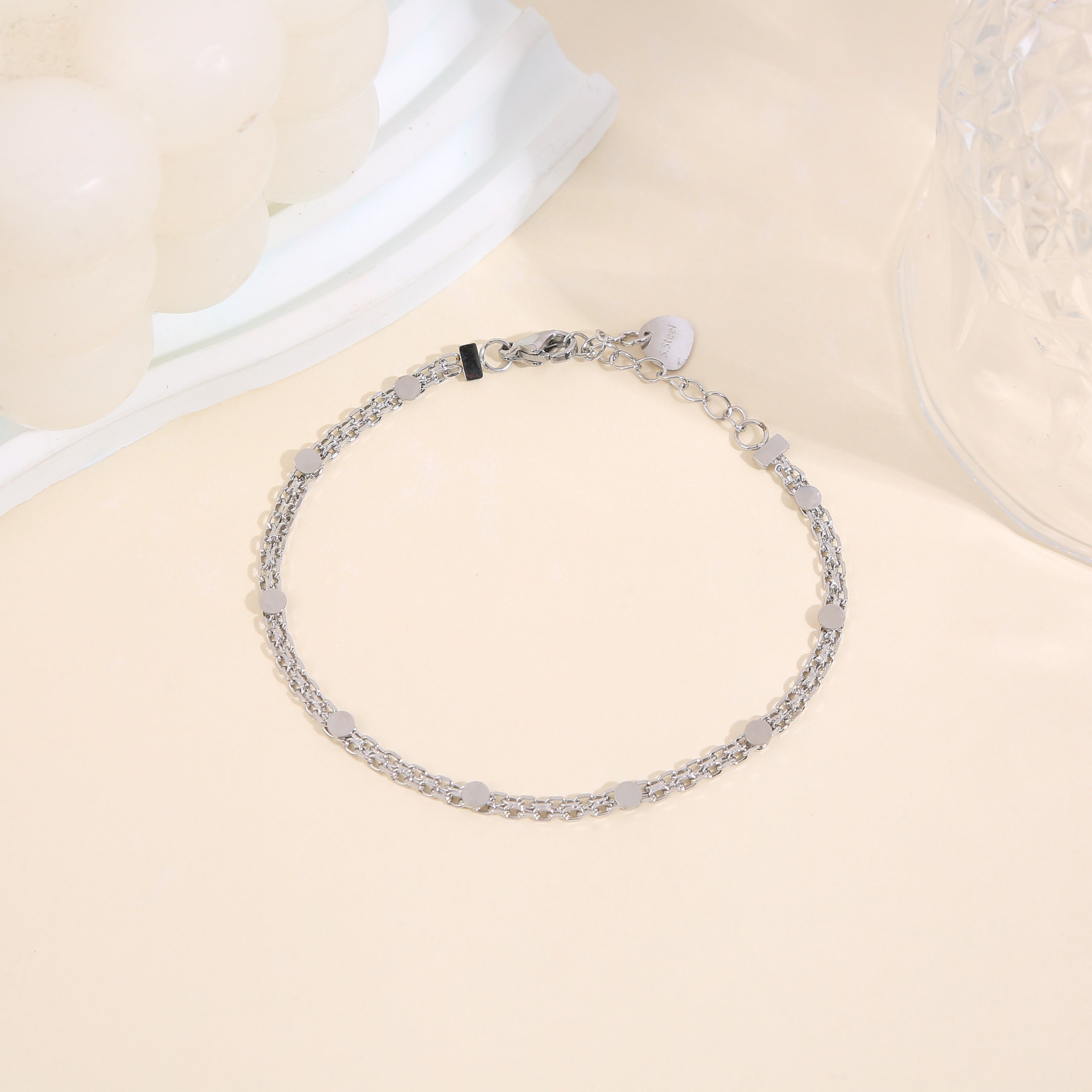 Bracciale a catena in argento a doppio filo con maglia a maglie fini e perline rotonde lisce