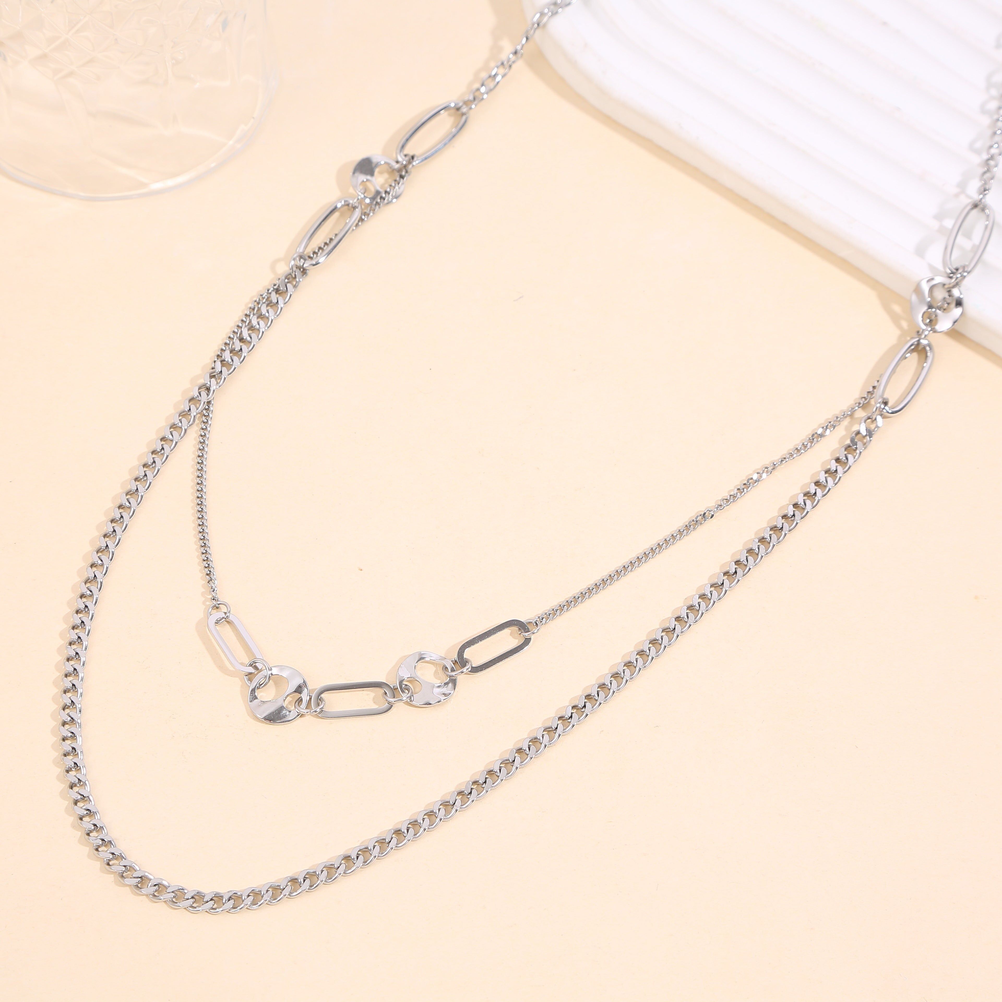 Collana sautoir multifilo in argento con maglie varie: catene sottili, catena a maglie larghe, maglie ovali grandi