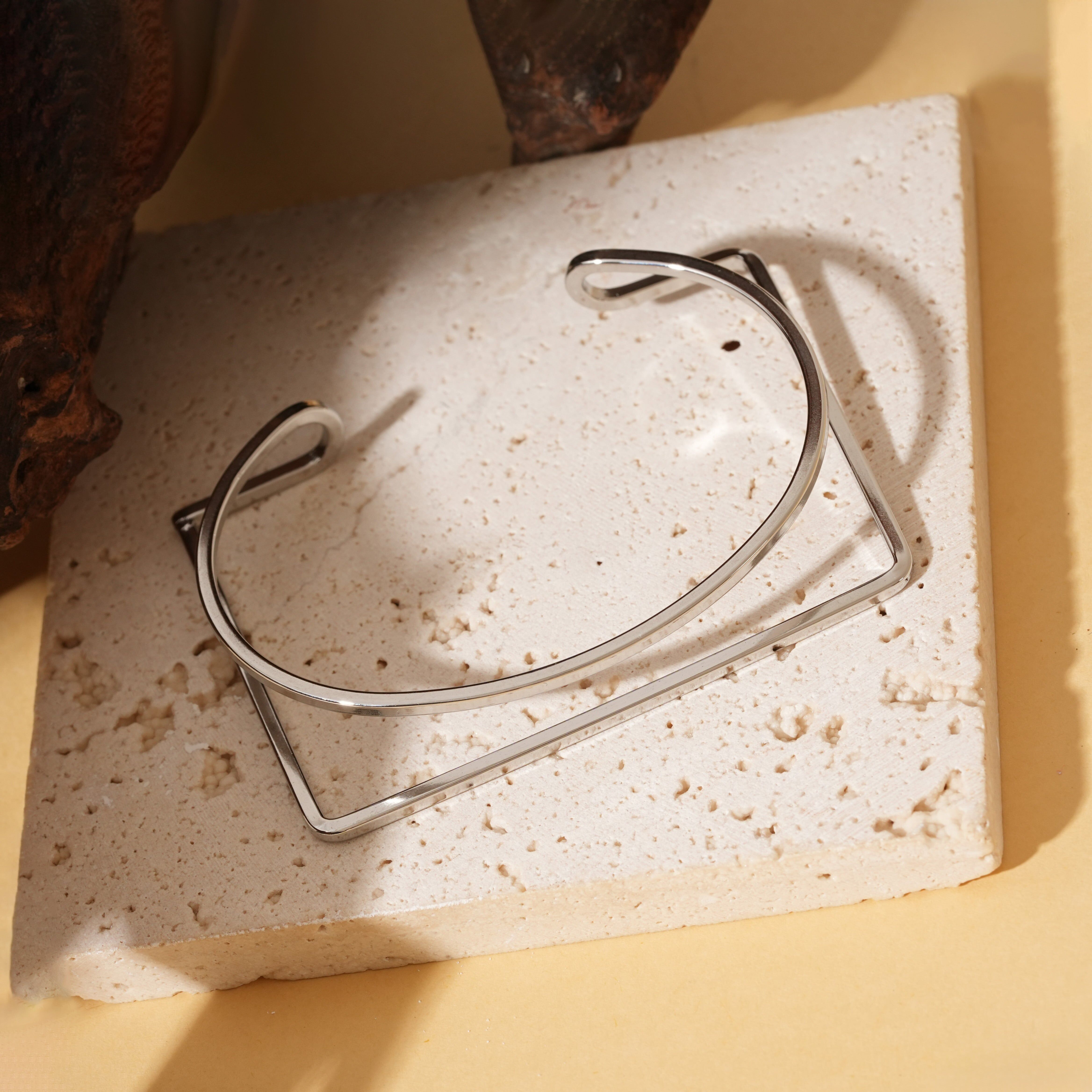 Bracciale doppio in argento, rotondo e rettangolare, intrecciati