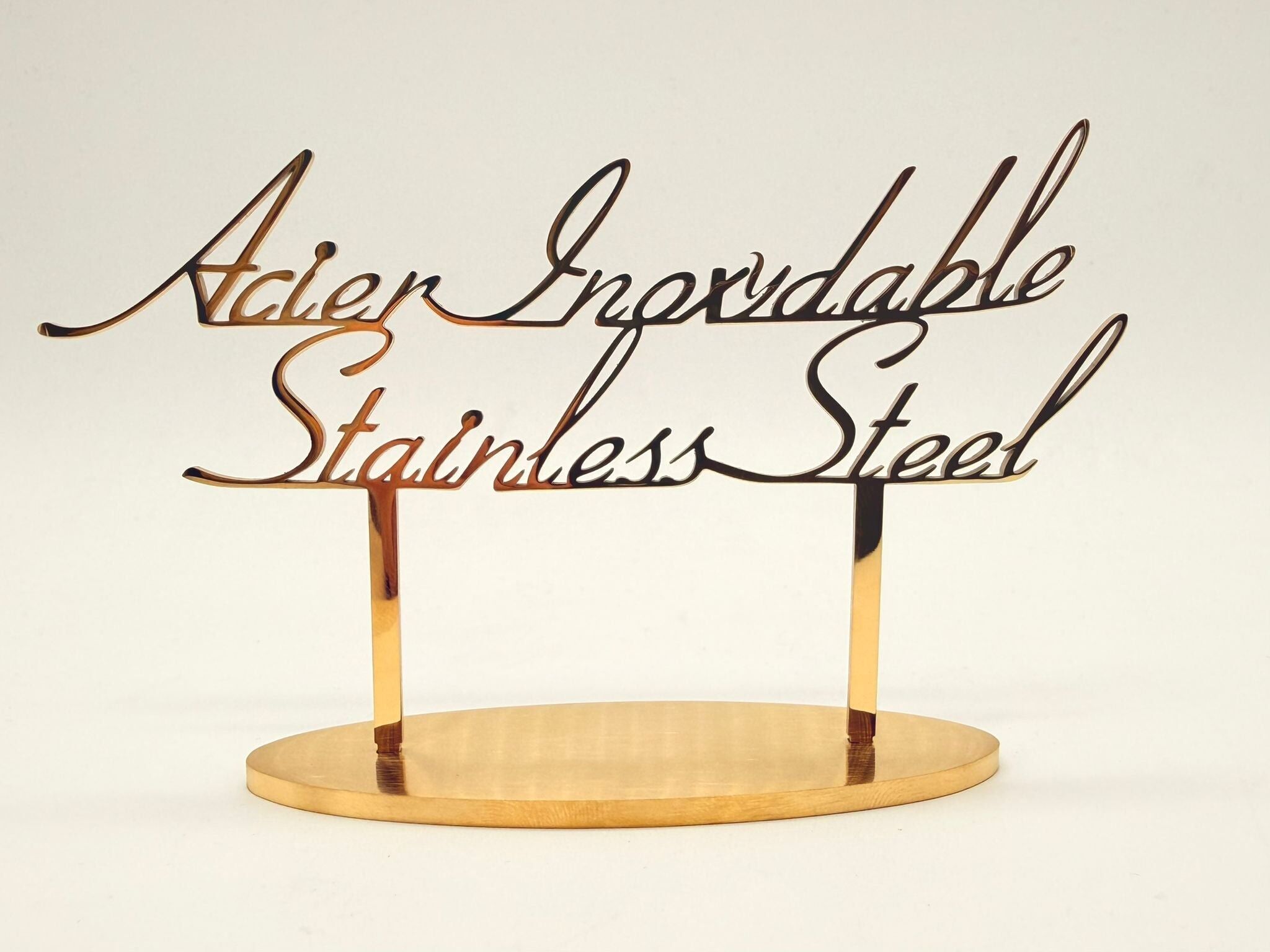 Espositore in acciaio inossidabile dorato