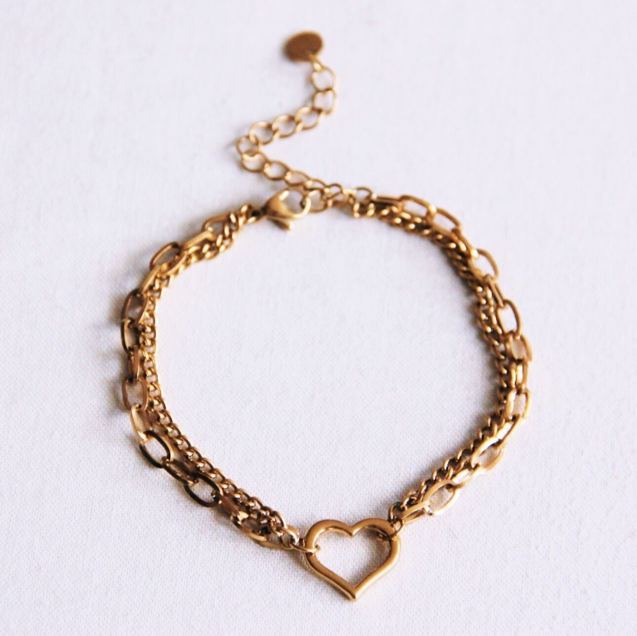 Pulsera de doble eslabón con corazón abierto - oro