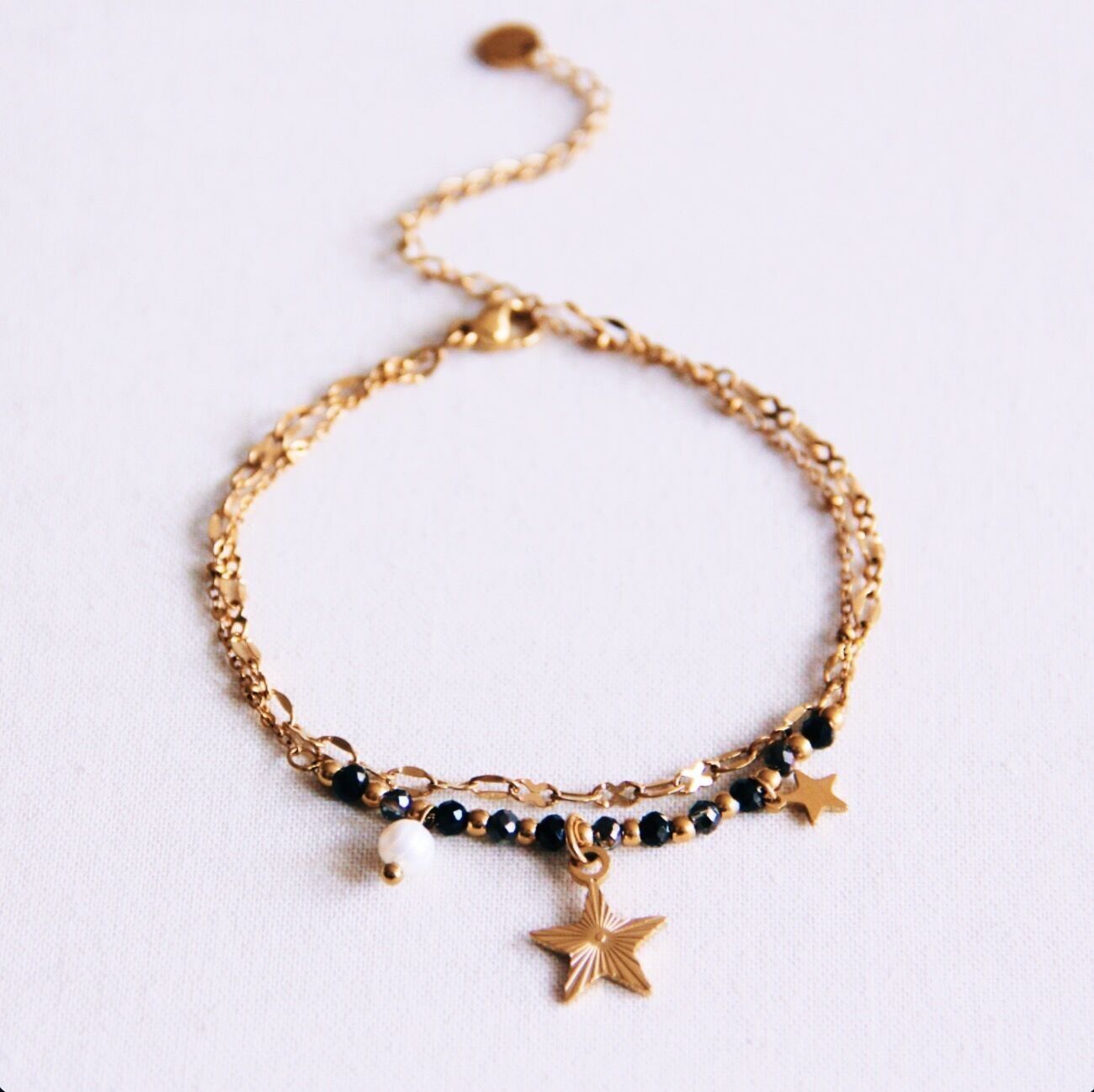 Pulsera doble de acero con mini facetas y estrella - antracita/oro