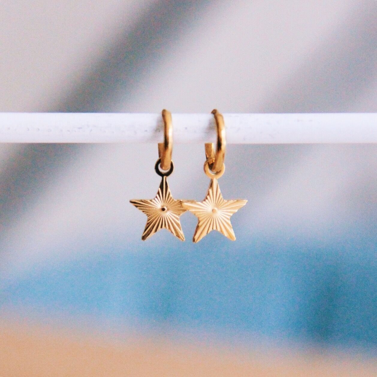 Orecchini a cerchio in acciaio inossidabile con stella fantasy - oro