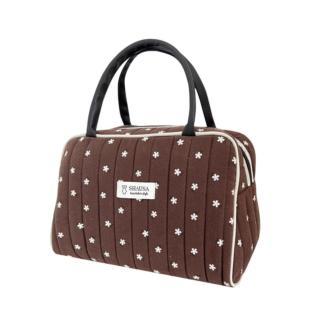 Brown quilted polyester bag with white flowers