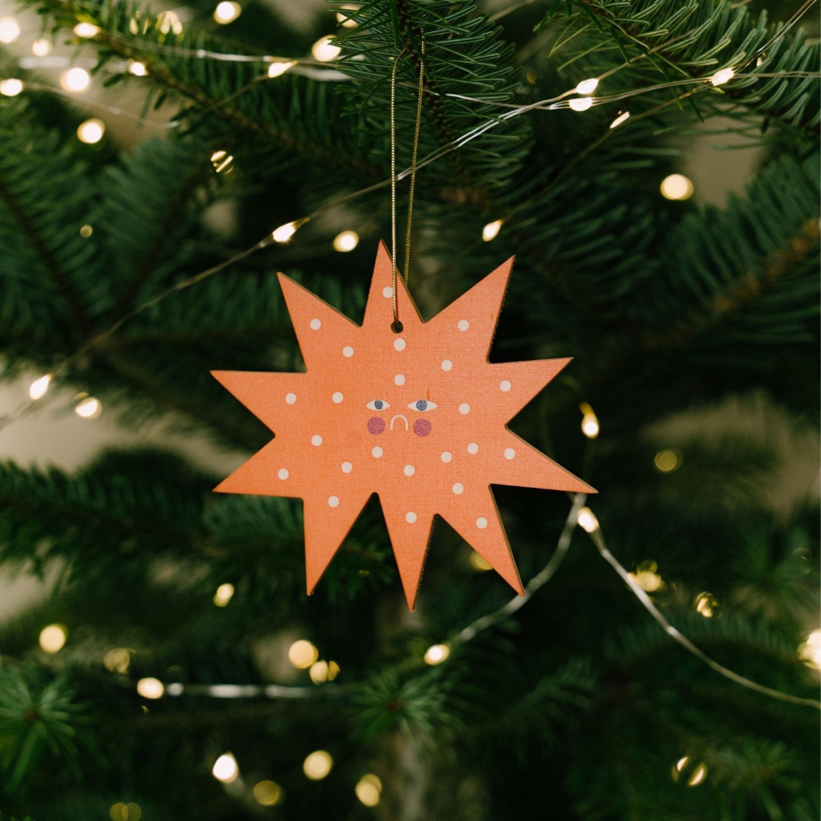 Star Christmas tree hanging decoration, festive holiday ornament