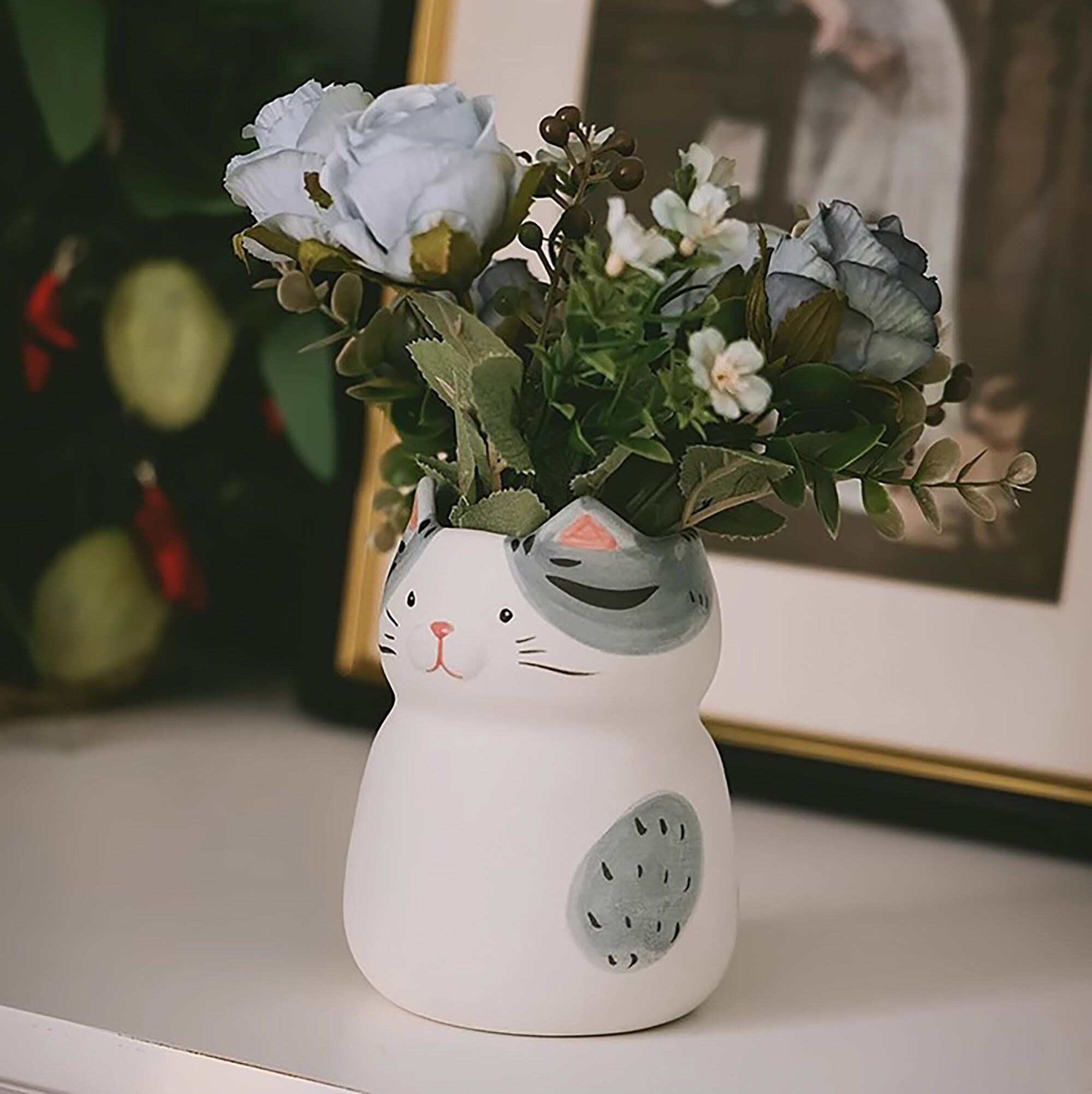 Vaso in ceramica a forma di gatto