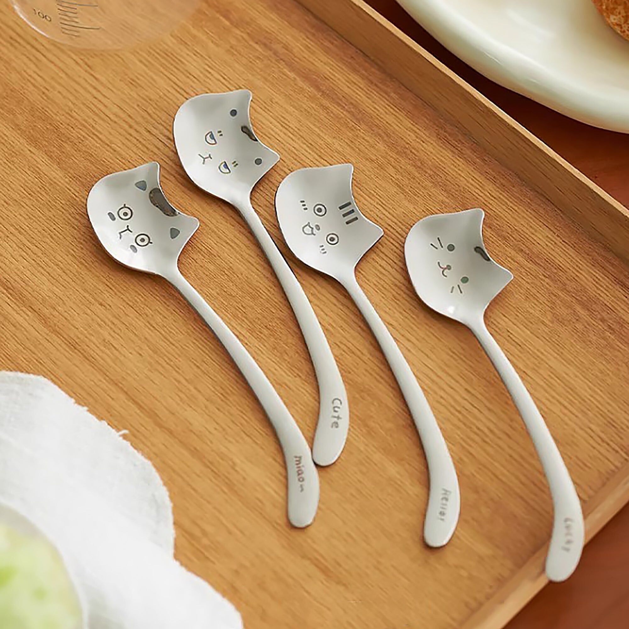 Cucchiaio in acciaio inossidabile con incisione di un simpatico gatto
