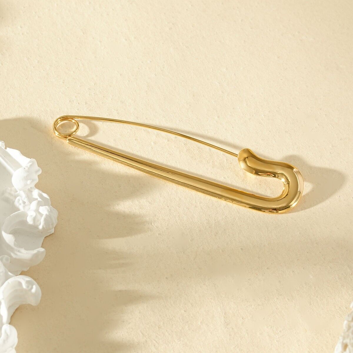 Spilla dorata in acciaio inossidabile