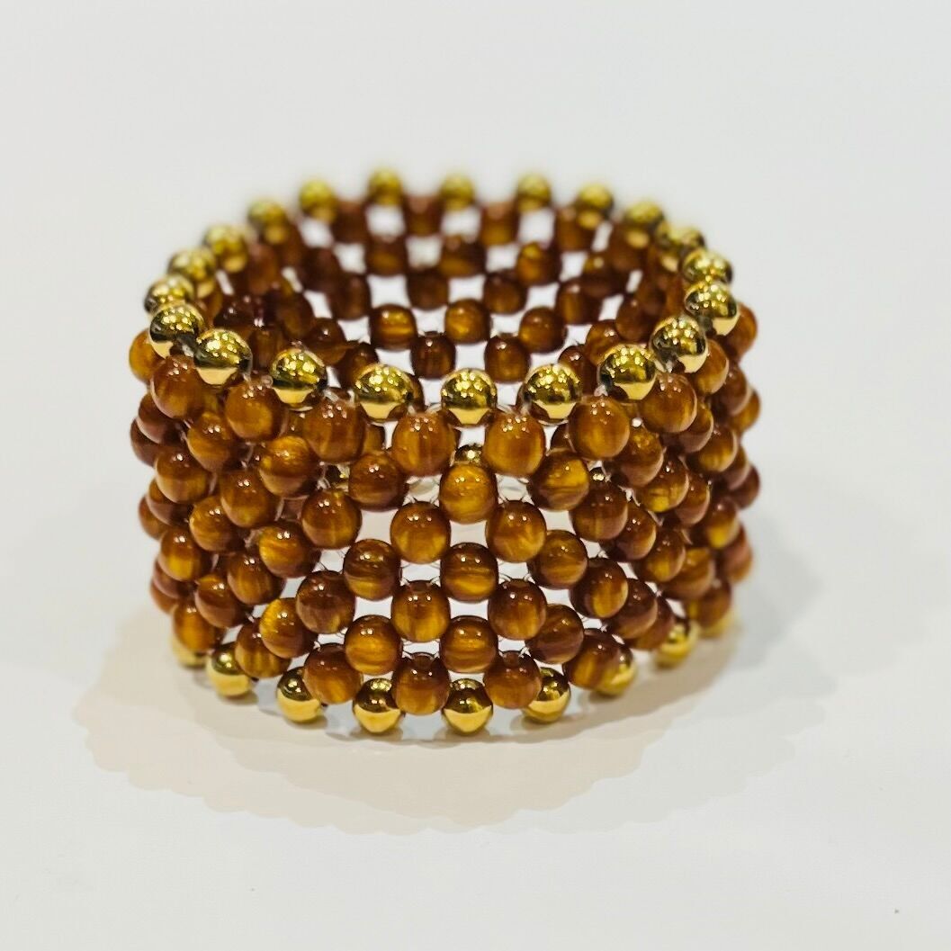 Bracciale elastico largo con perline occhio di gatto