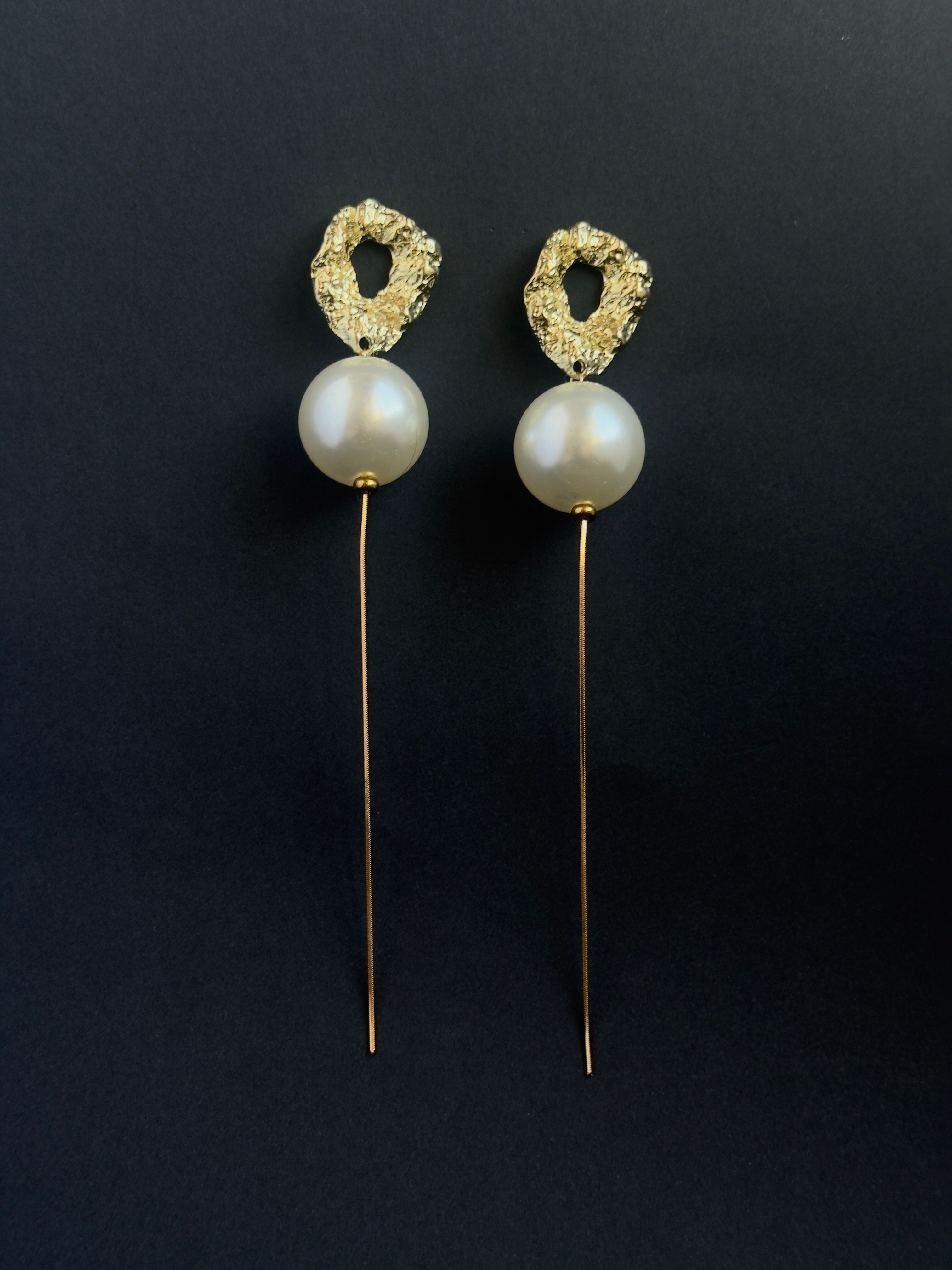 ORECCHINI CON NAPPINE