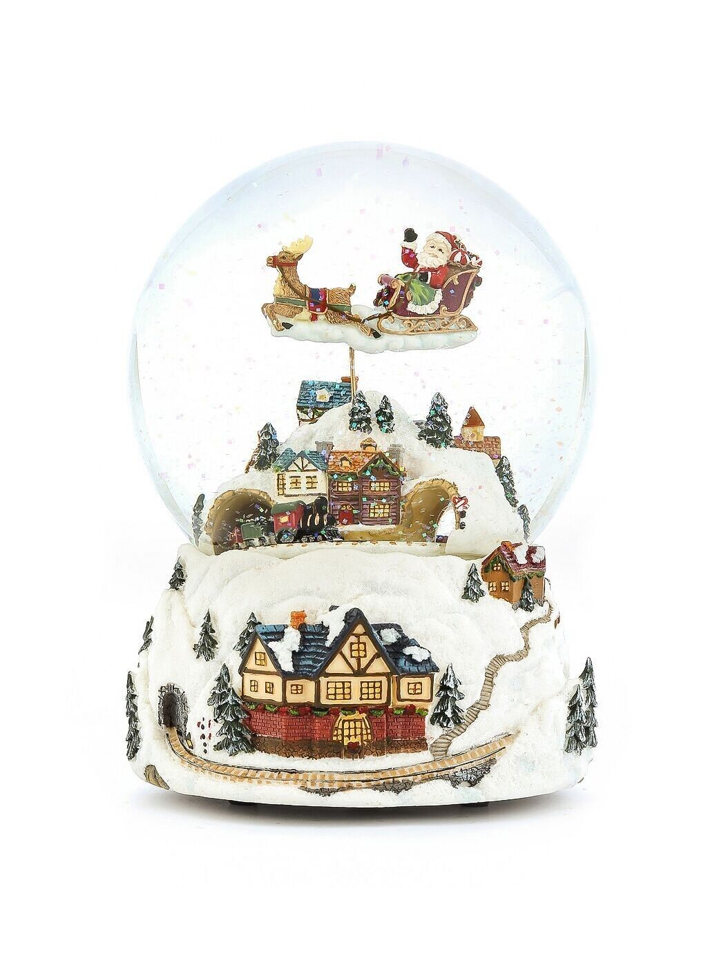 Die große Schneekugel „Heiligabend, der Weihnachtsmann kommt bald!“Eine kleine Dampflok fährt durch das Dorf und