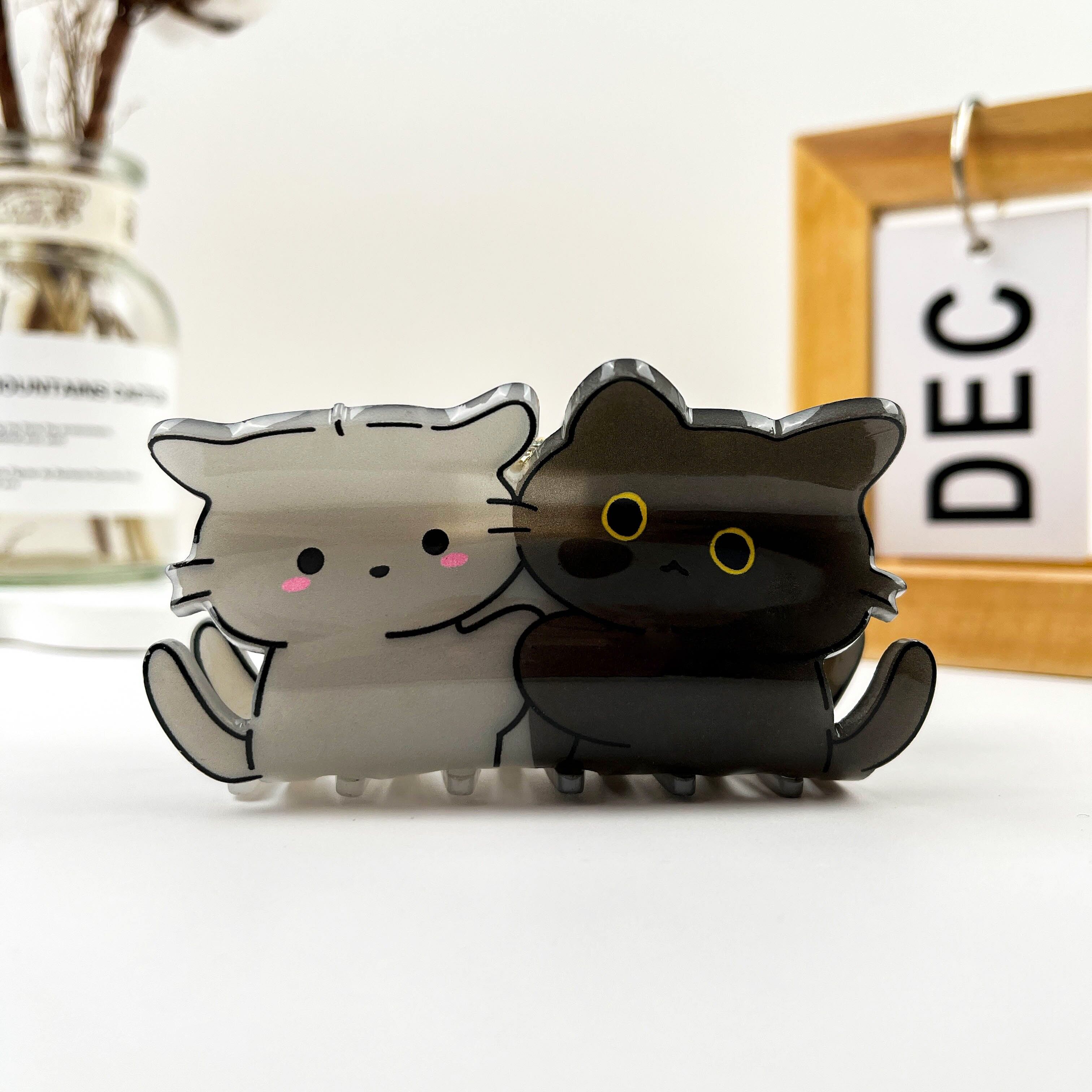 Haarspange aus Acryl mit schwarzem und grauem Kätzchenmuster