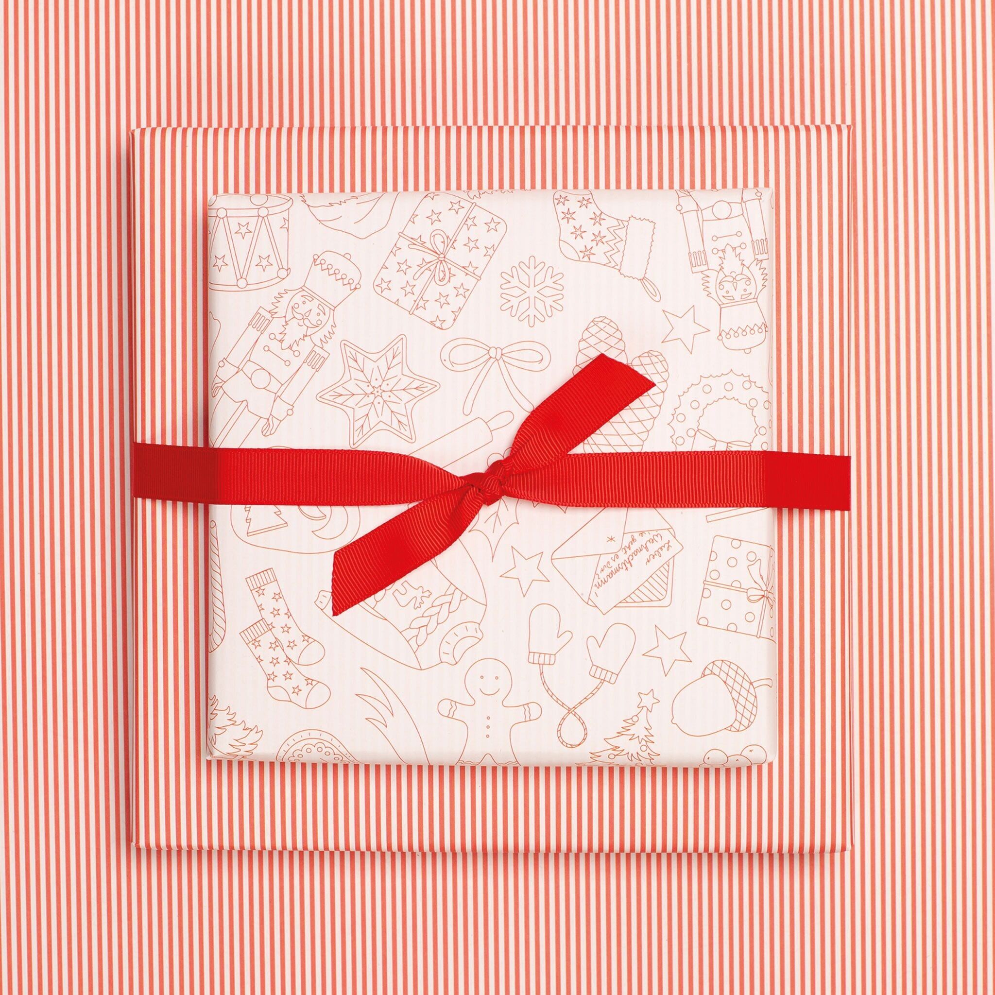 Pagina da colorare con scarabocchi natalizi su carta da regalo - bianco e rosso