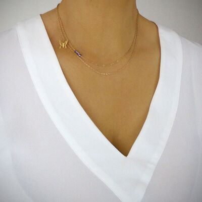 Collier plaqué or 18 carats avec papillon et cristal de tanzanite