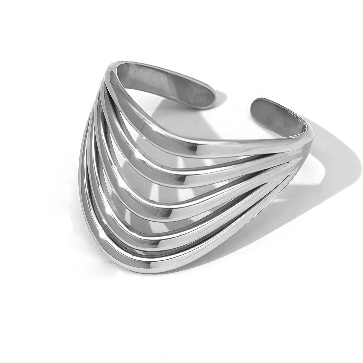 Anello regolabile in argento con motivo traforato e 5 punte curve