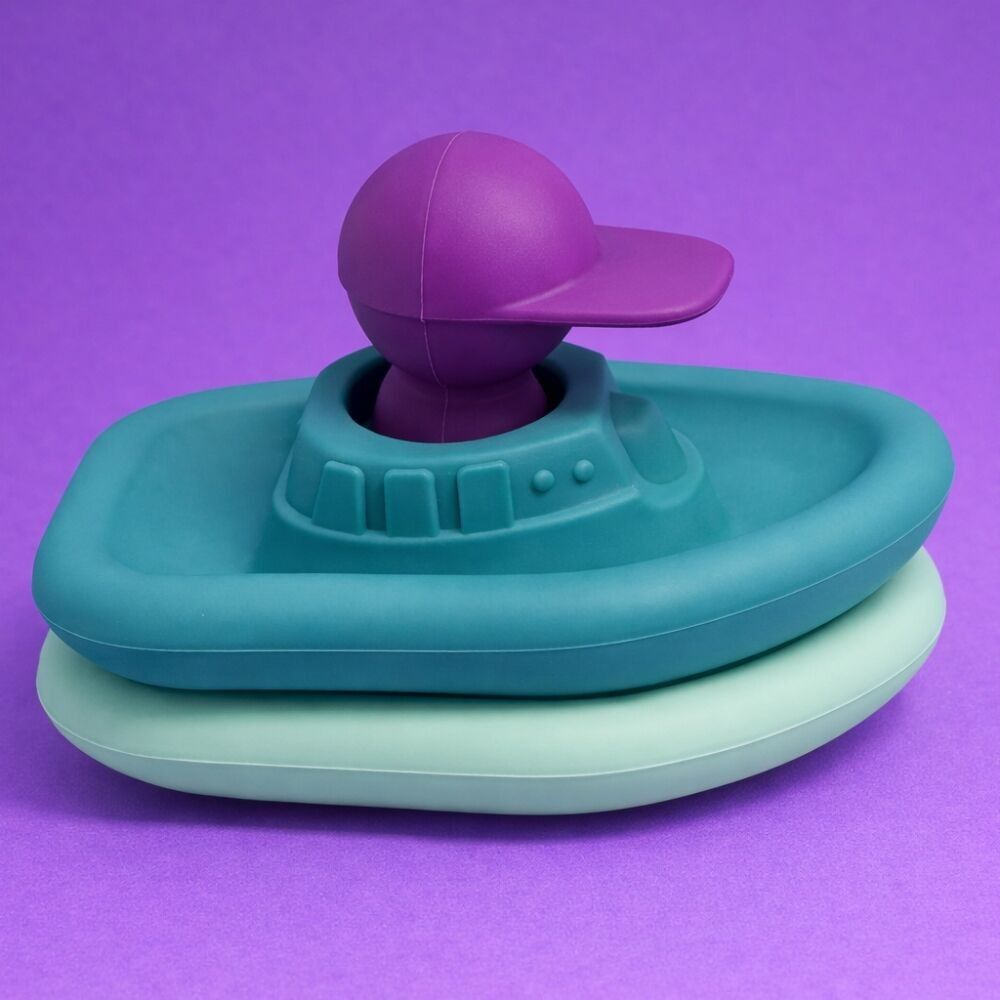 Jouet d'éveil pour le bain en silicone - Set de 2 bateaux + 1 capitaine vert/aubergine - Jouets éducatif - Marque française