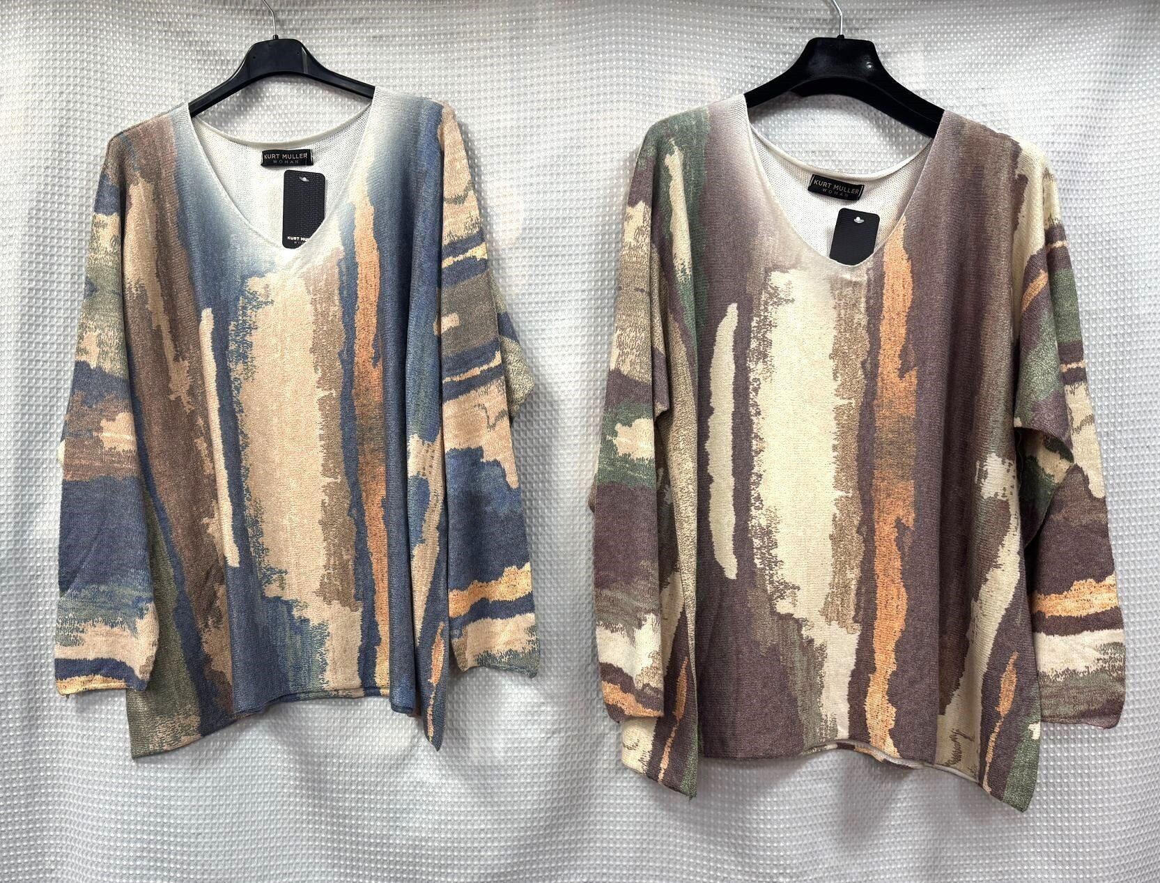 Topaz, cuello en V, mezcla de lana fina, corte holgado.