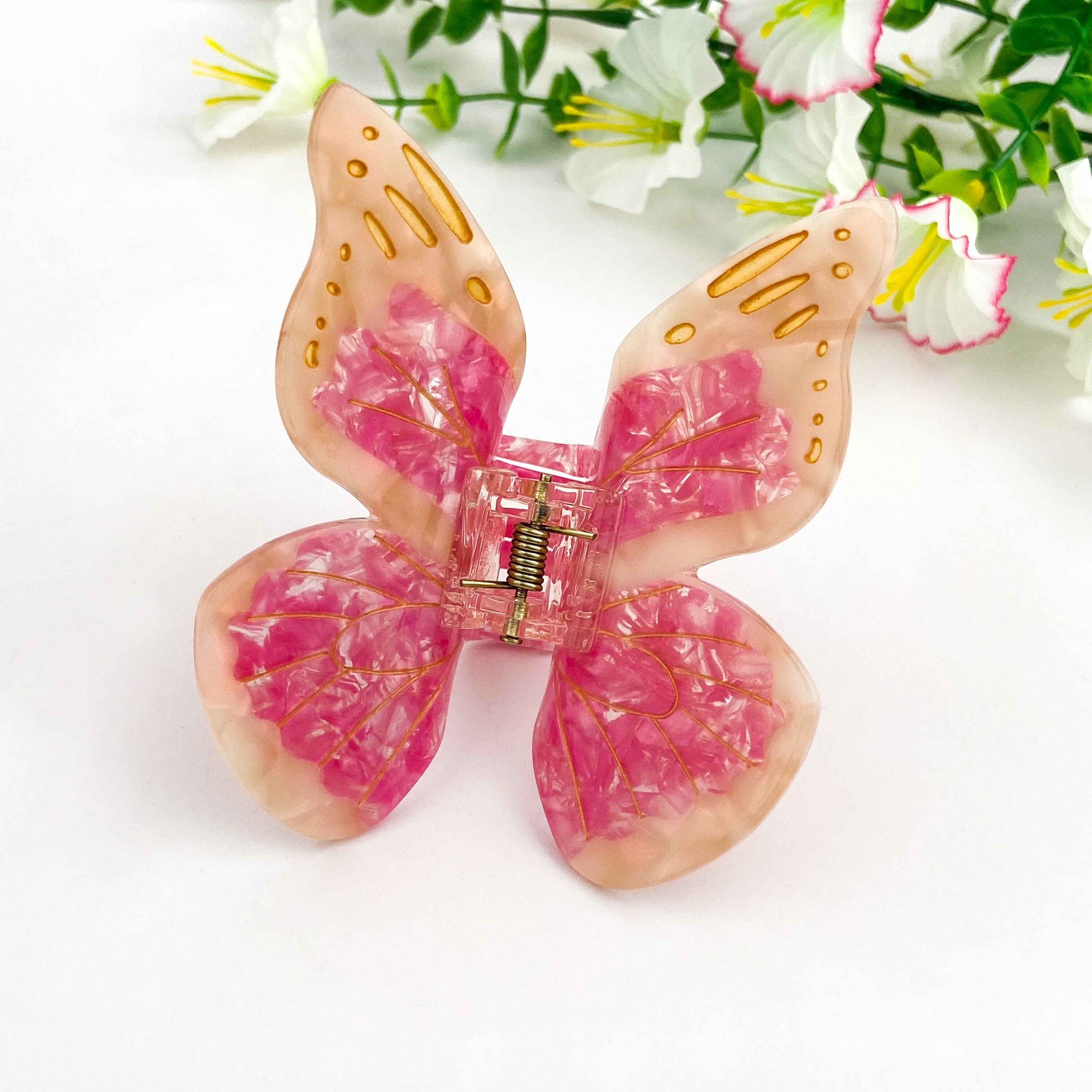 Haarspange mit rosa Monarchfalter