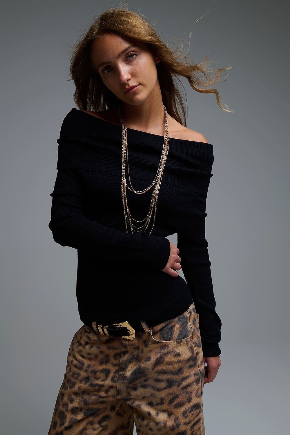 Top in maglia chic con scollo a barca e spalle scoperte, colore nero