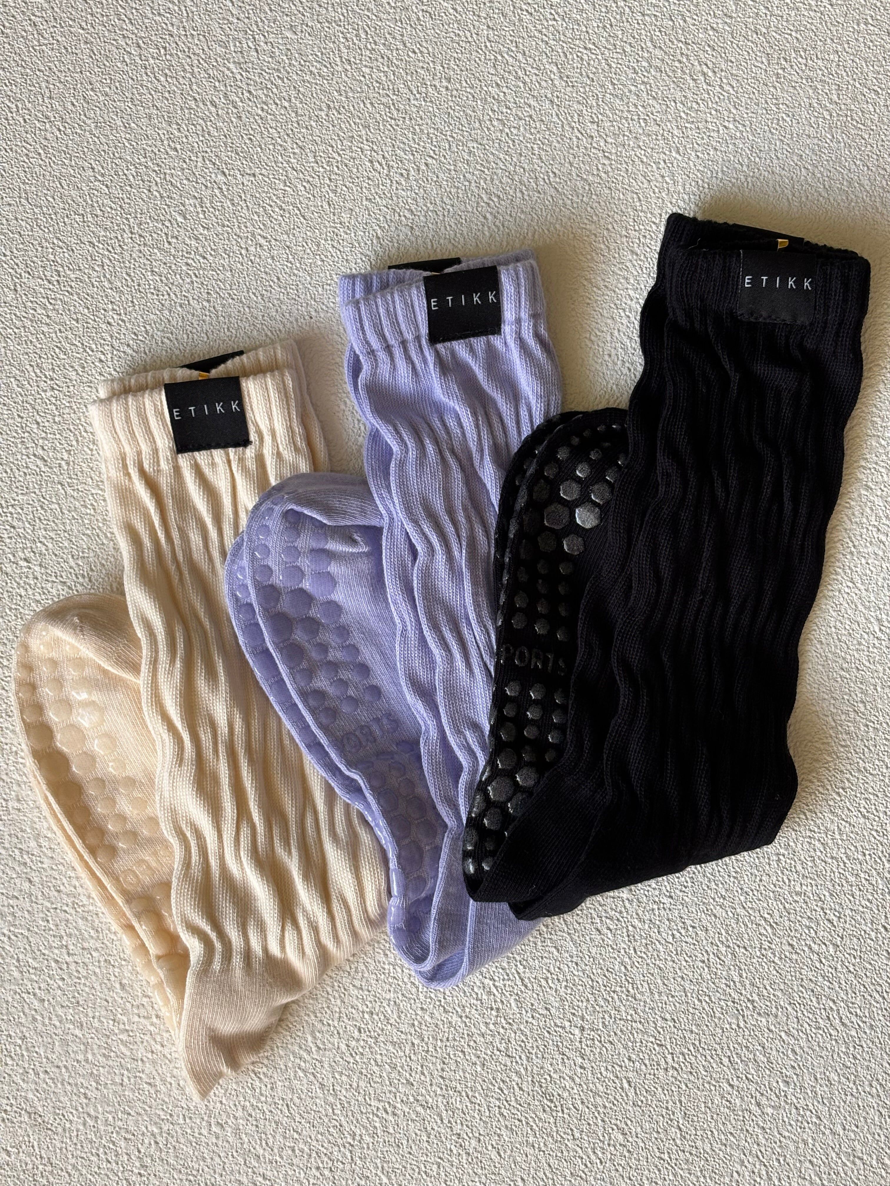 Calcetines antideslizantes de caña alta para pilates y yoga