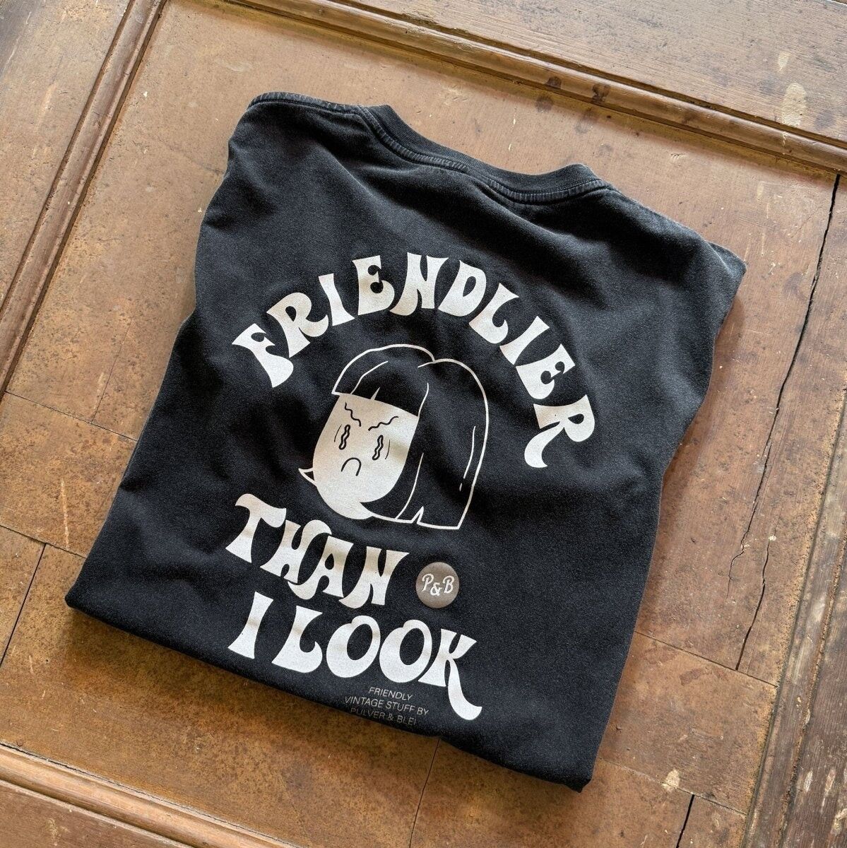 Friendlier then i look - Vintage Black Tee