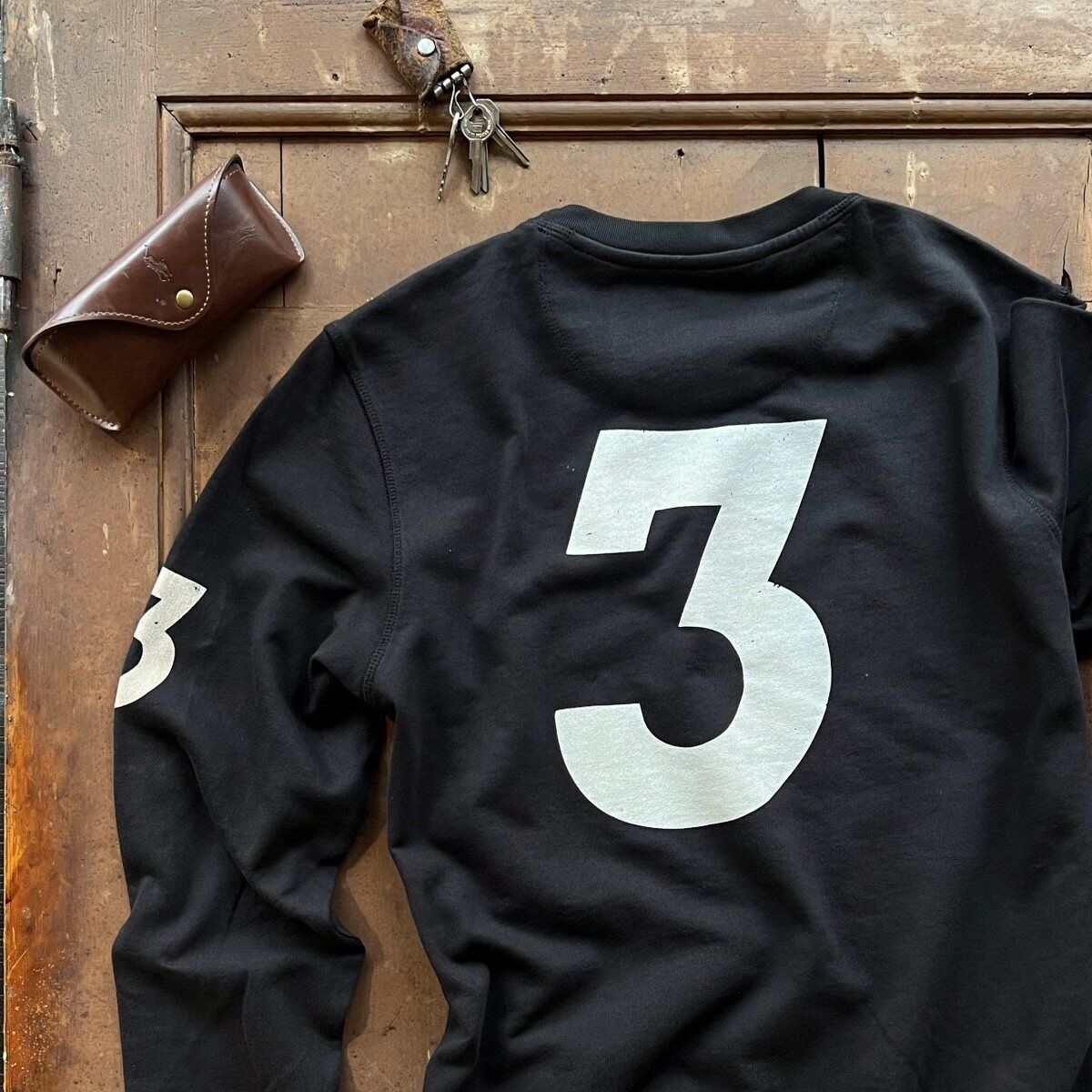 Sudadera negra para adictos a las carreras de arena