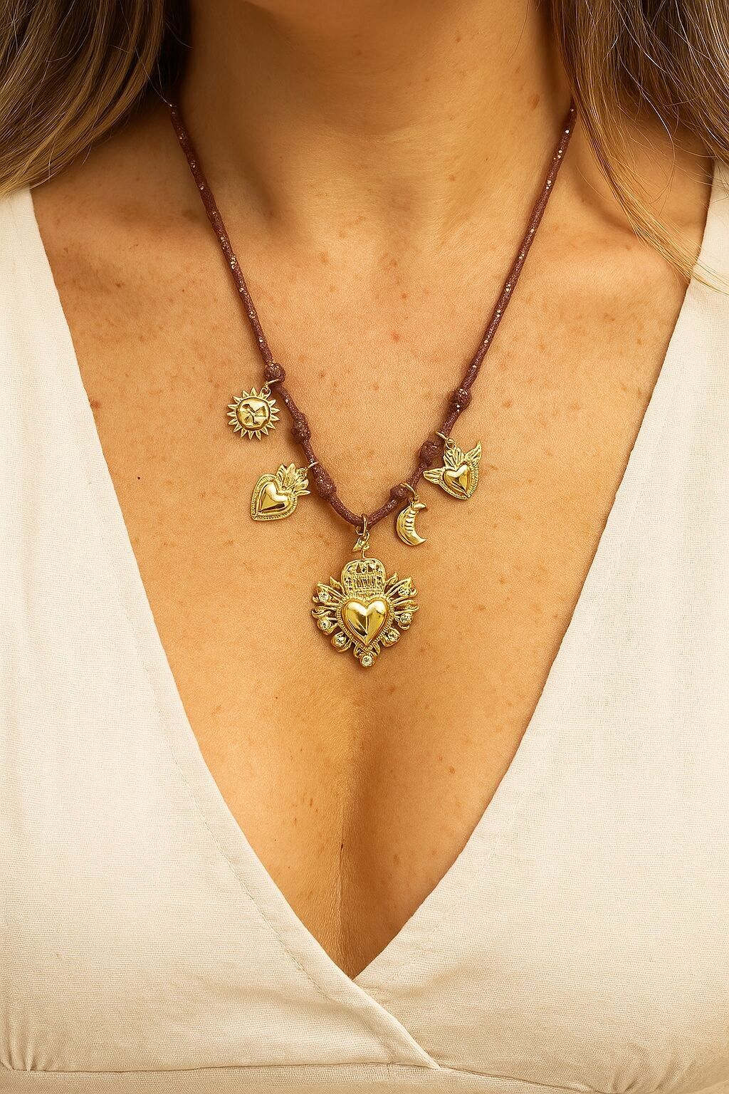Collana con ciondoli del Sacro Cuore