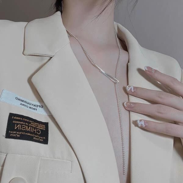 Collana minimalista con catena a palline lunga