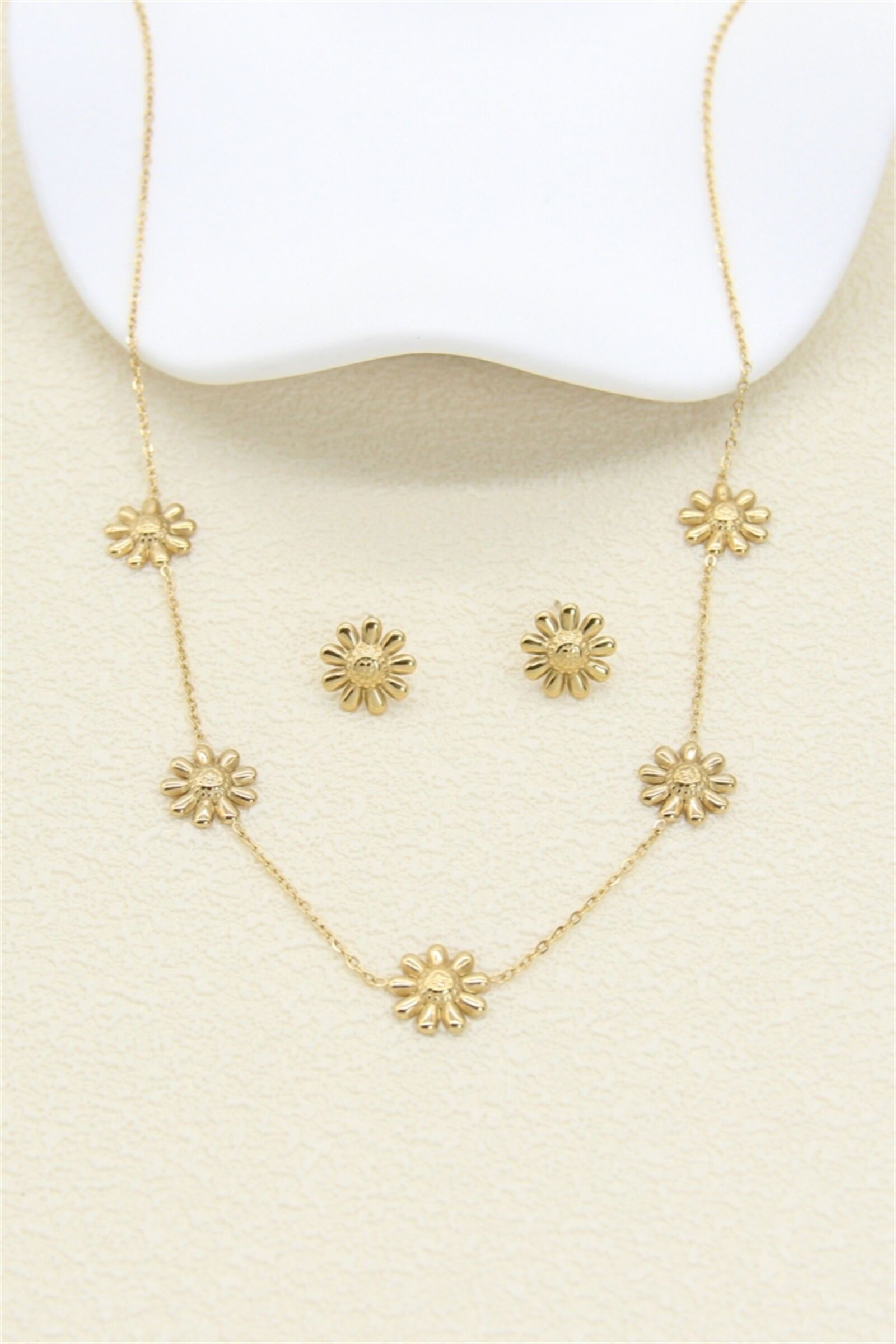 Set aus goldenen Gänseblümchen – Edelstahl