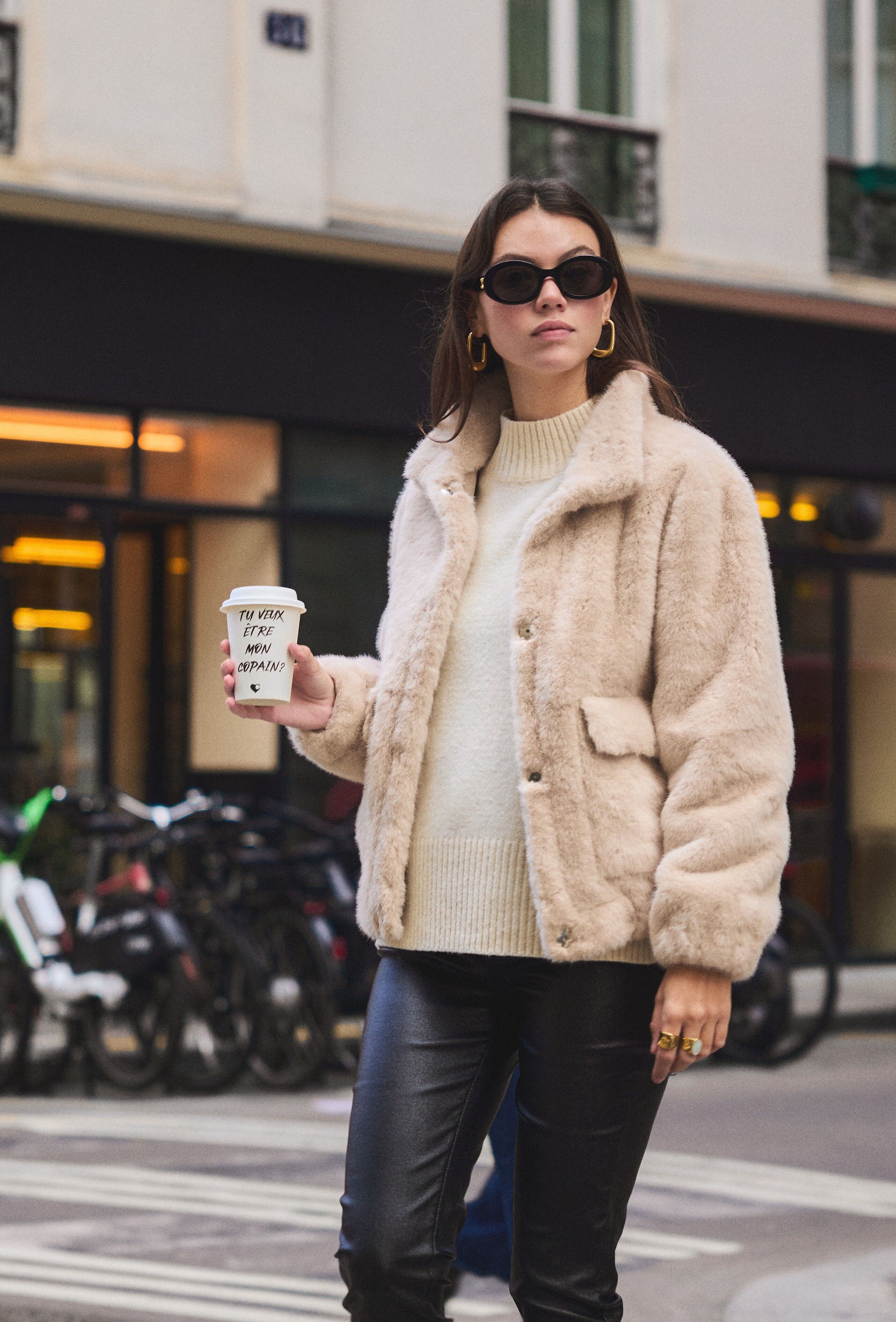 Giacca in pelliccia sintetica con tasche