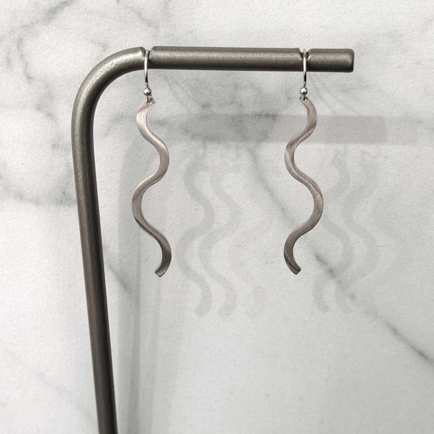 Orecchini ricci in acciaio inossidabile