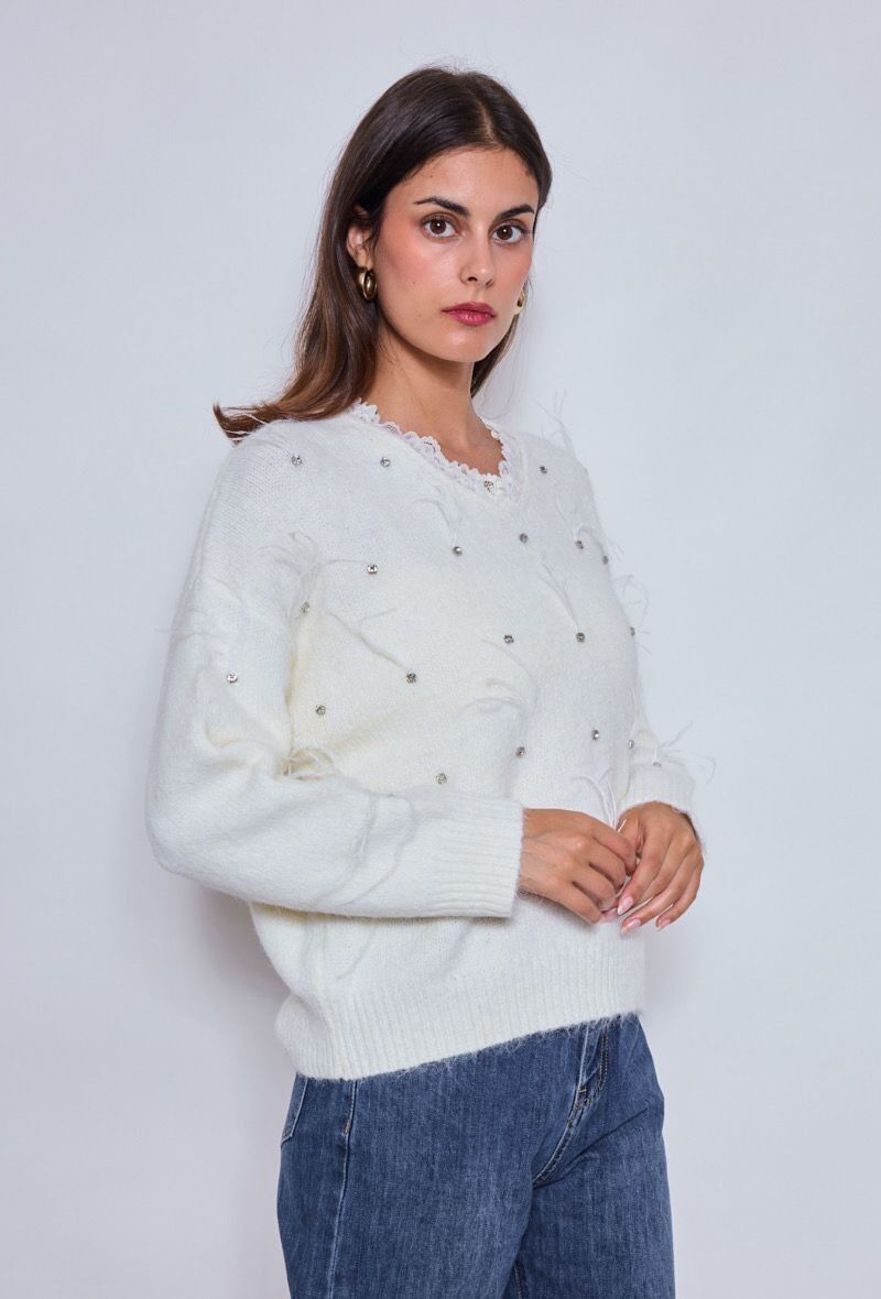 Maglione con scollo a V fantasia con pizzo e fili decorativi
