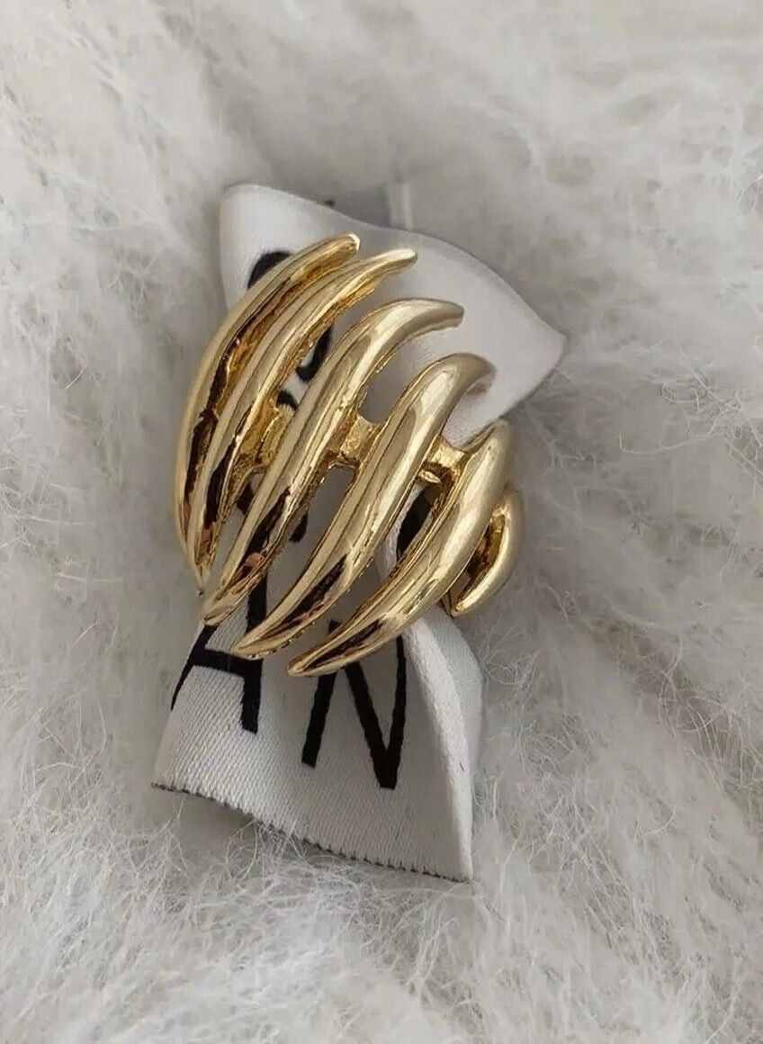 Anello regolabile in oro spesso e scultoreo con più rami