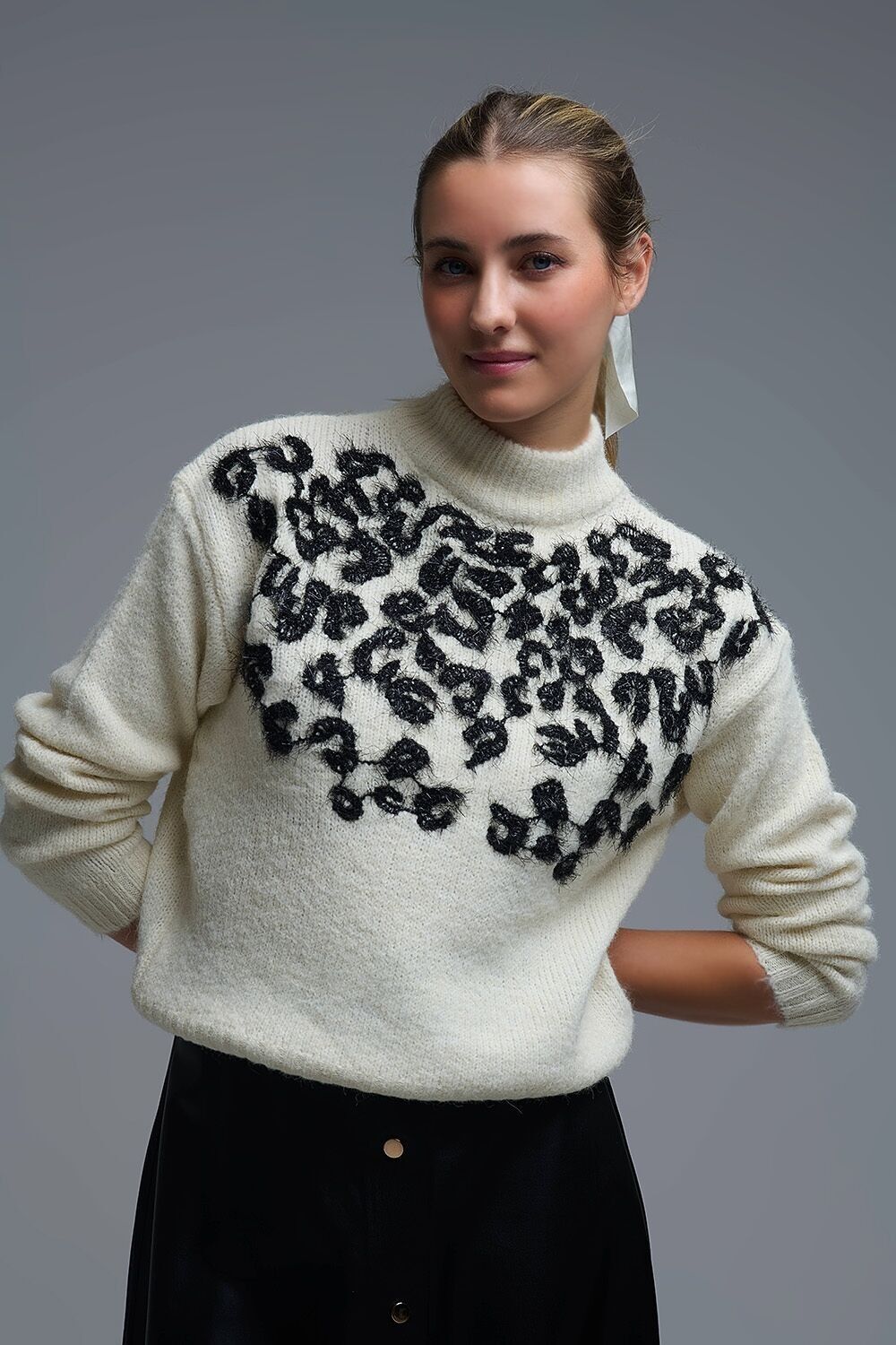 White Knitted Sweater with Abstract Design